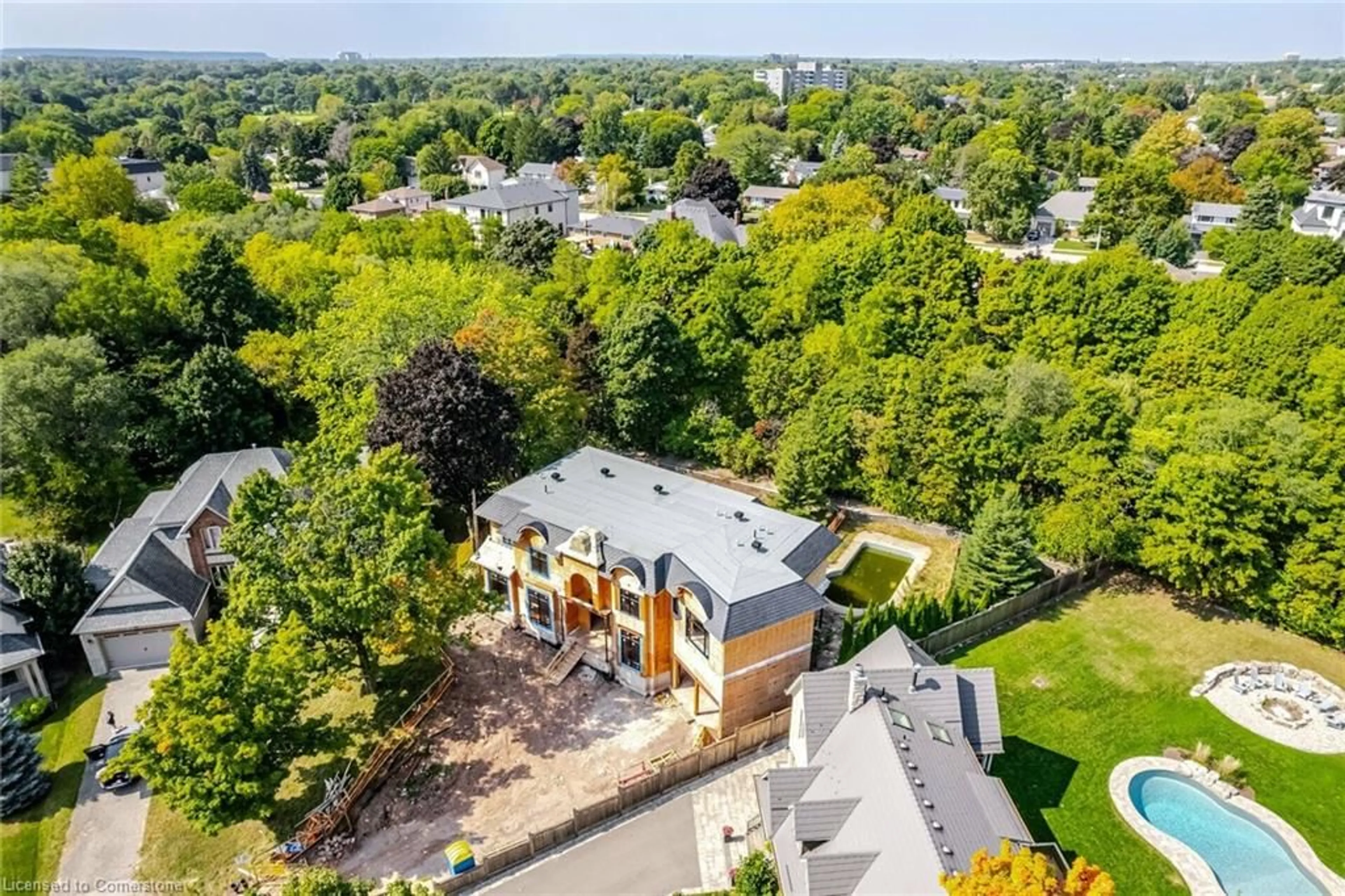 A pic from exterior of the house or condo, the fenced backyard for 1134 Truman Ave, Oakville Ontario L6H 1Y8