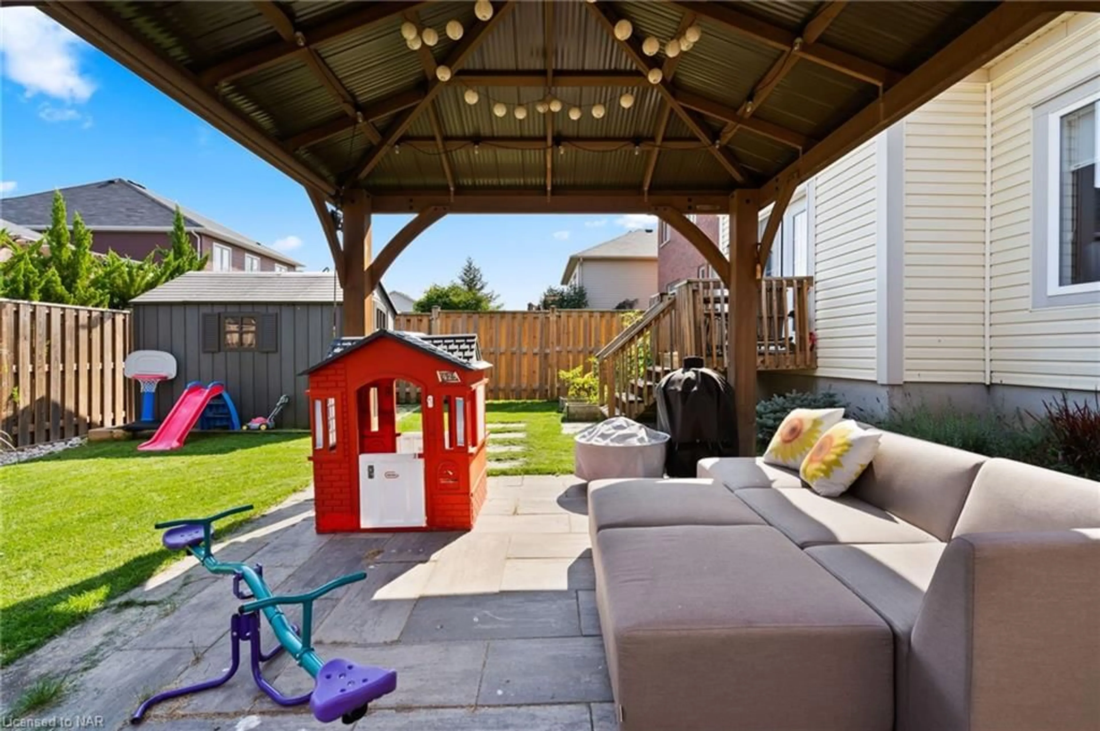 Patio, the fenced backyard for 7 Cannery Drive, Niagara-on-the-Lake Ontario L0S 1J0