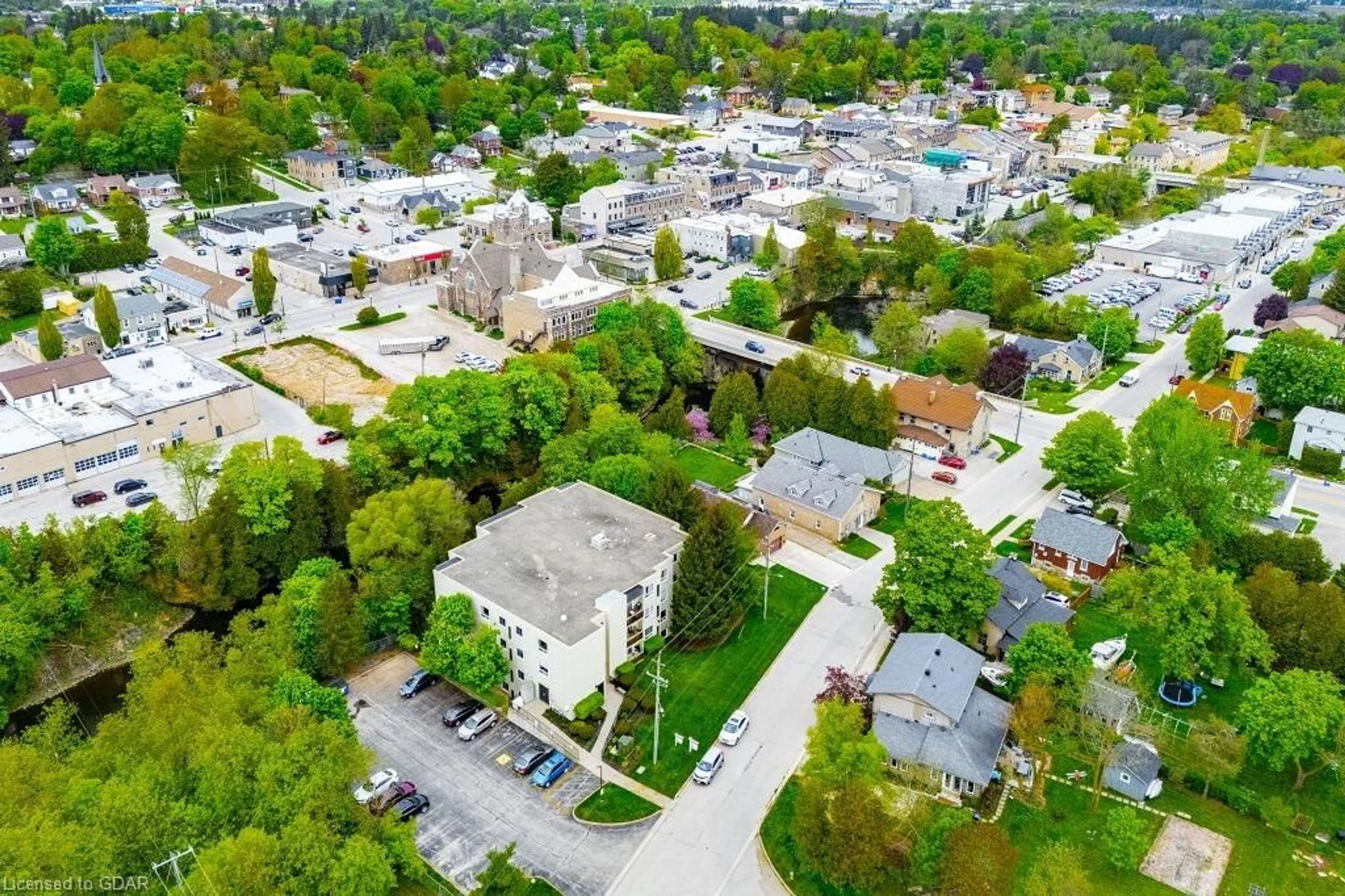 A pic from exterior of the house or condo, the street view for 245 Queen St #103, Fergus Ontario N1M 3R6