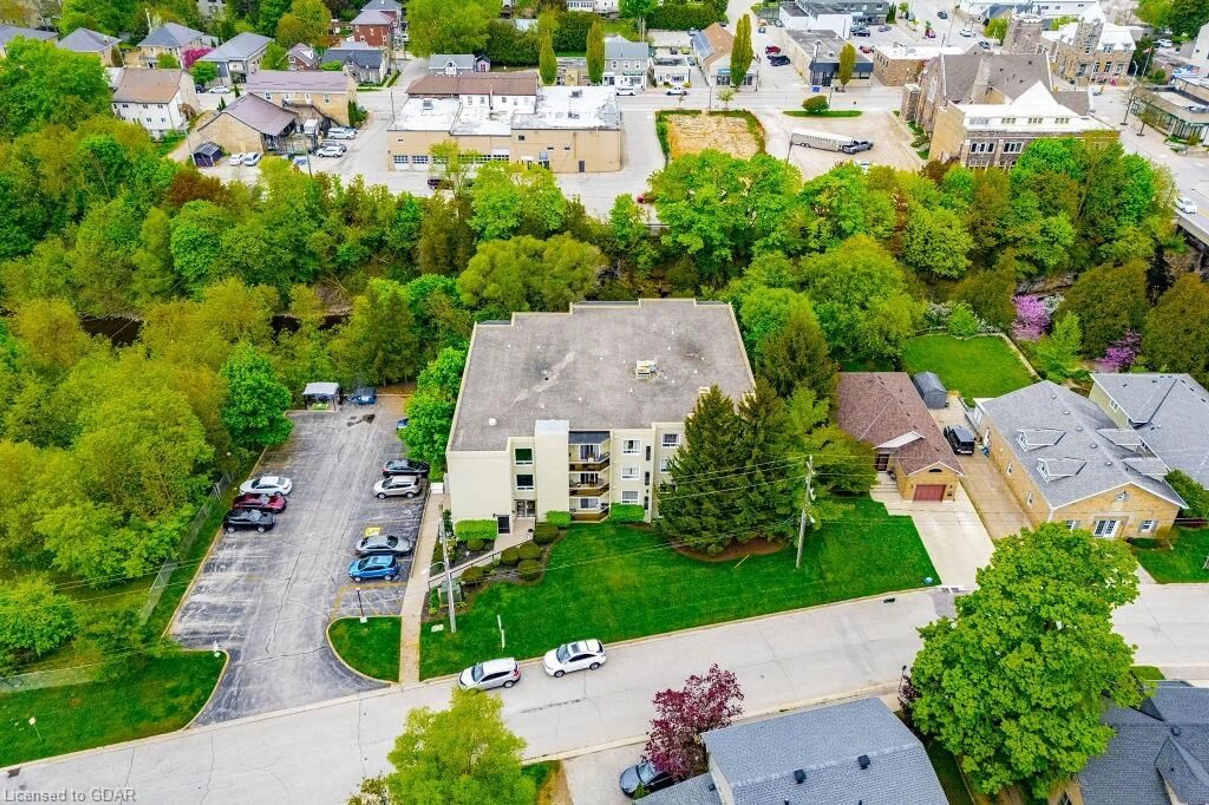 A pic from exterior of the house or condo, the street view for 245 Queen St #103, Fergus Ontario N1M 3R6