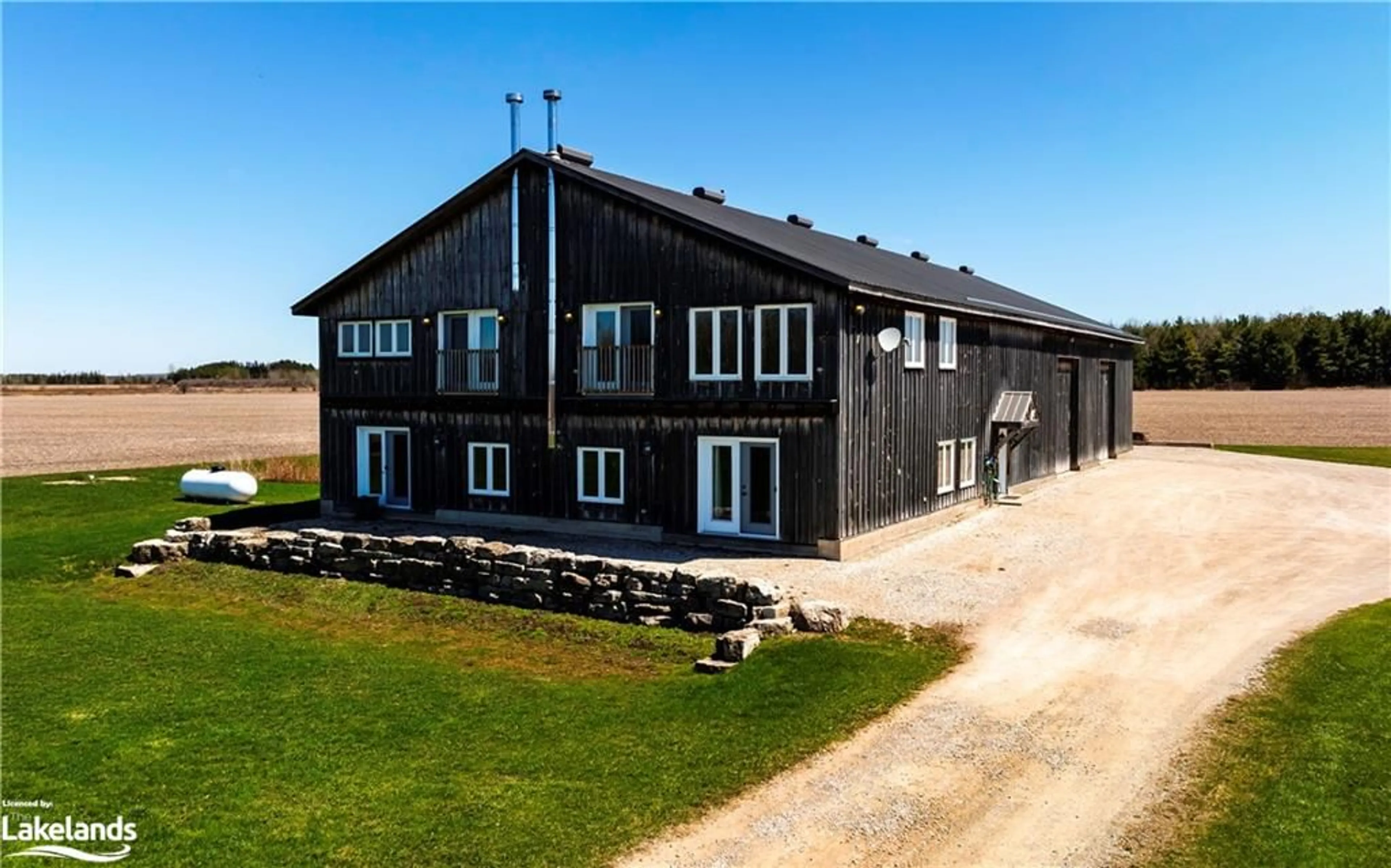 Frontside or backside of a home, the front or back of building for 295089 8th Line, Amaranth Ontario L9W 0K1