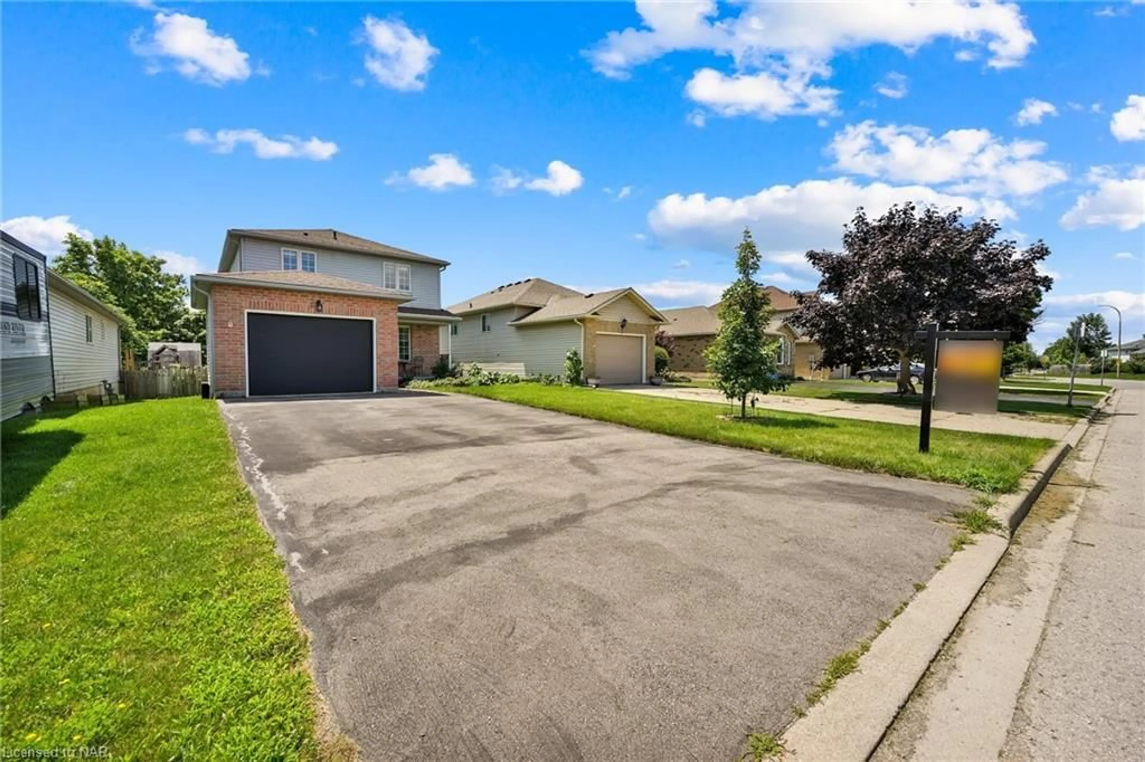 Frontside or backside of a home, the fenced backyard for 5 Longview Dr, Mount Hope Ontario L0R 1W0