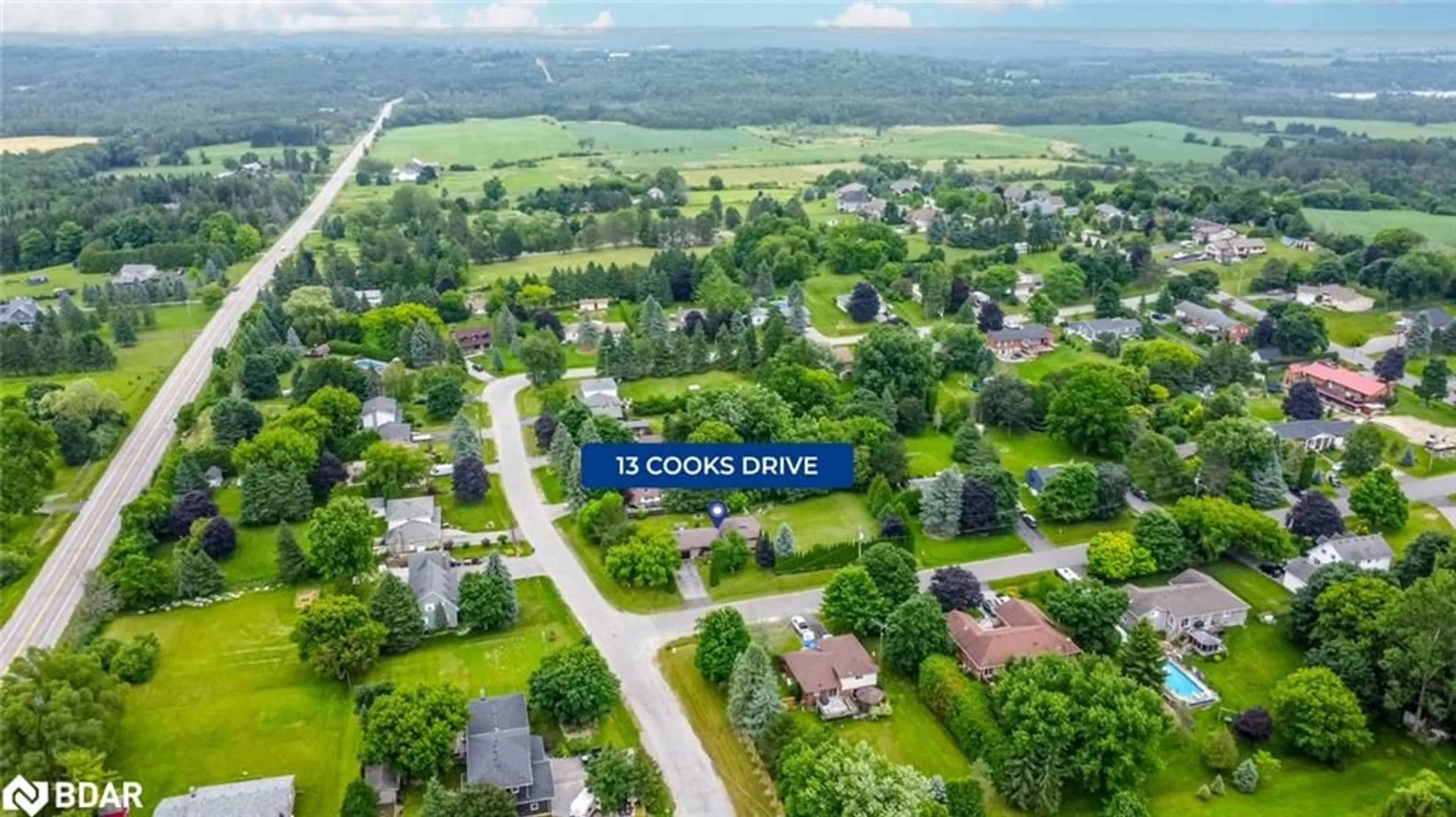 A pic from exterior of the house or condo, the street view for 13 Cooks Dr, Uxbridge Ontario L0C 1C0