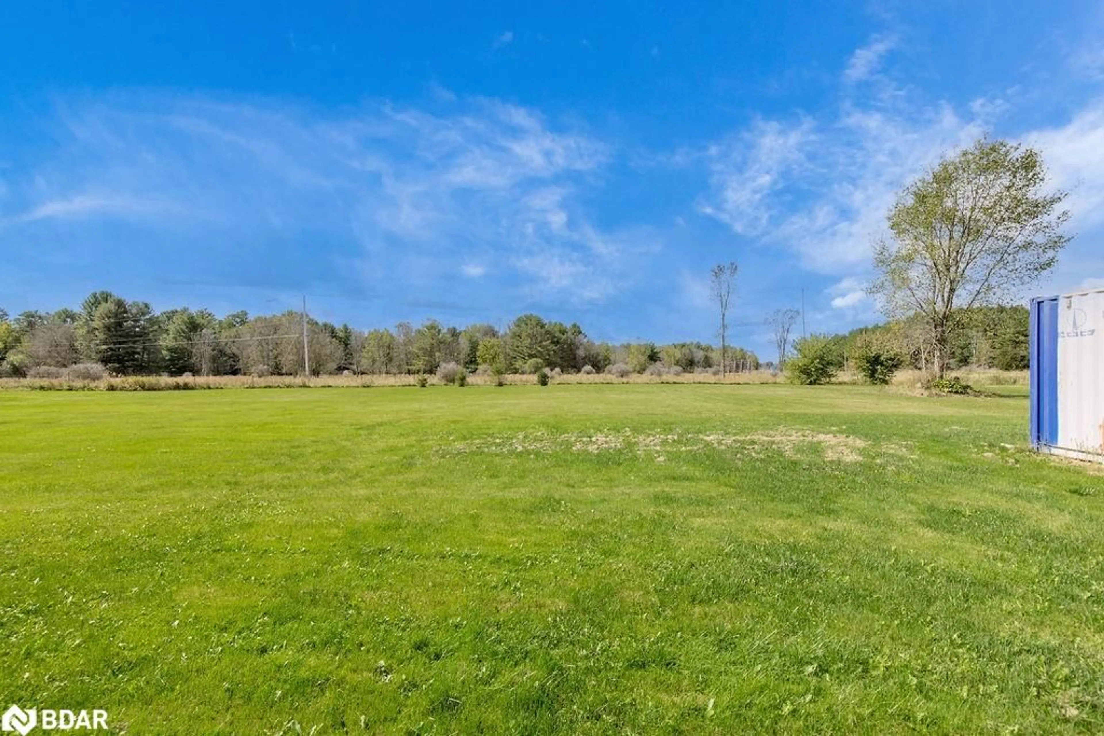 A pic from exterior of the house or condo, the fenced backyard for 776 Monck Road 45, Sebright Ontario L0K 1W0