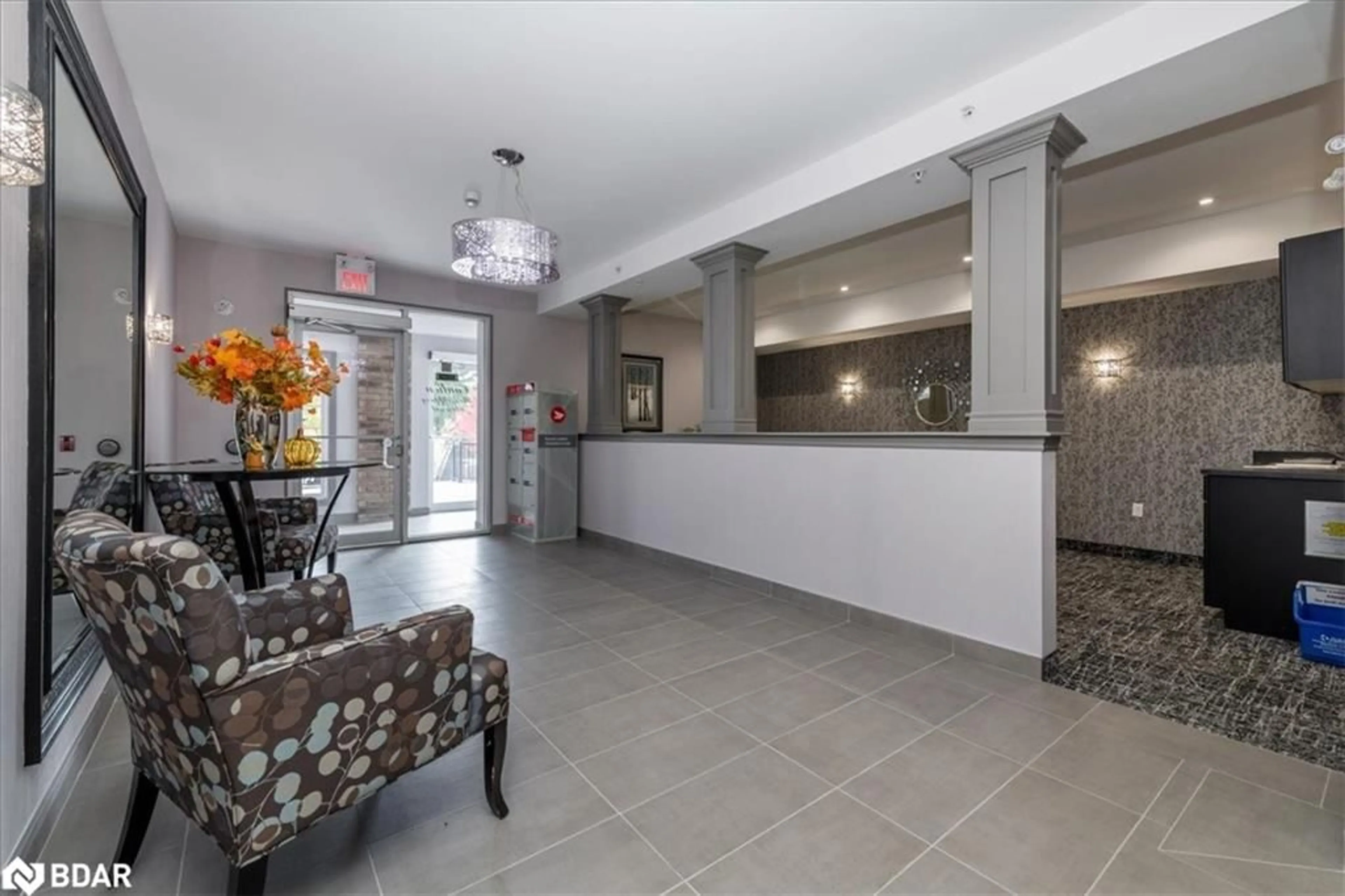 Indoor lobby, cement floor for 45 Ferndale Dr #206, Barrie Ontario L4N 5W7