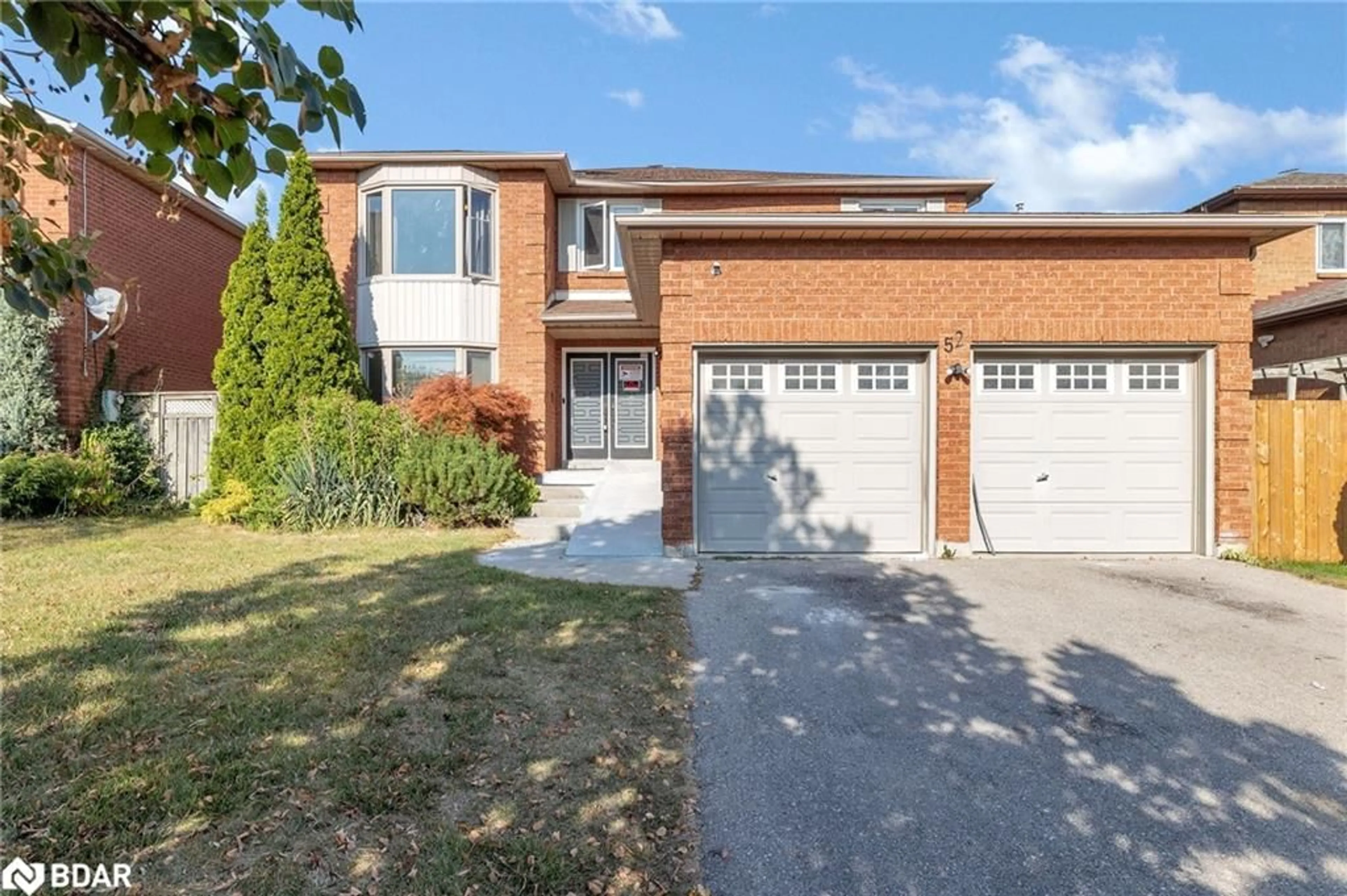 Home with brick exterior material for 52 Settler Crt, Brampton Ontario L6Z 4L7