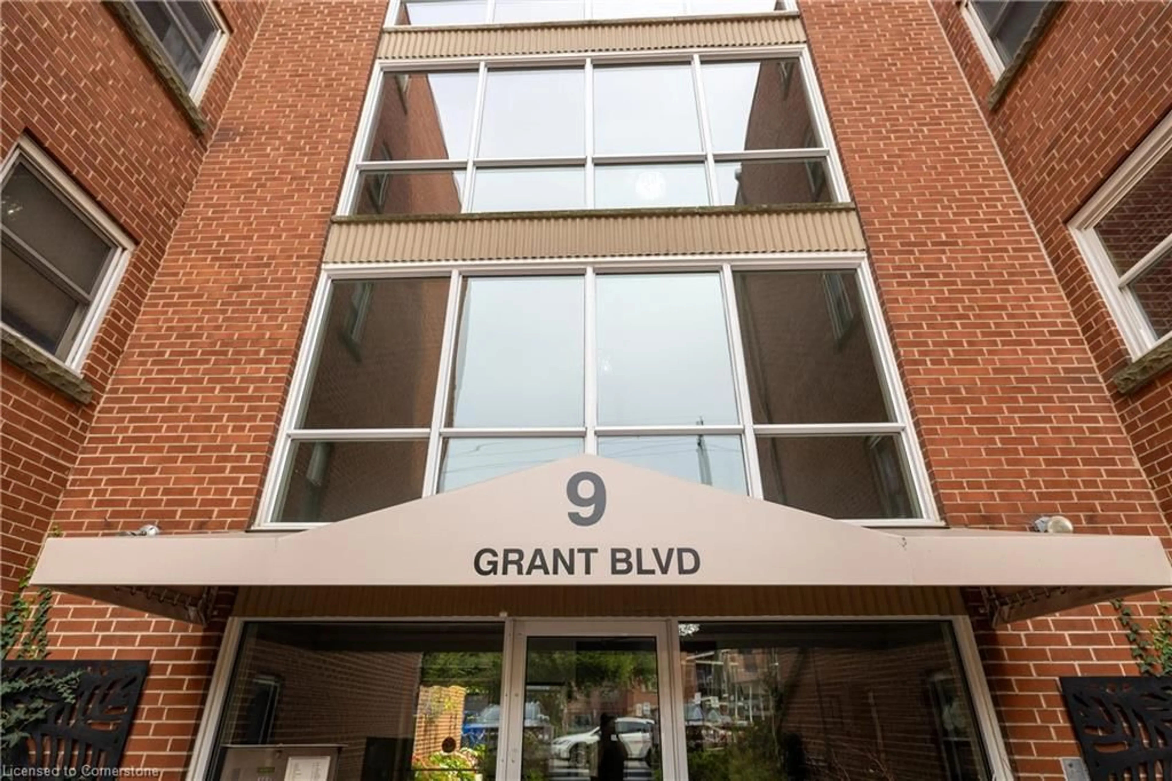 A pic from exterior of the house or condo, the front or back of building for 9 Grant Blvd #103, Dundas Ontario L9H 4L5