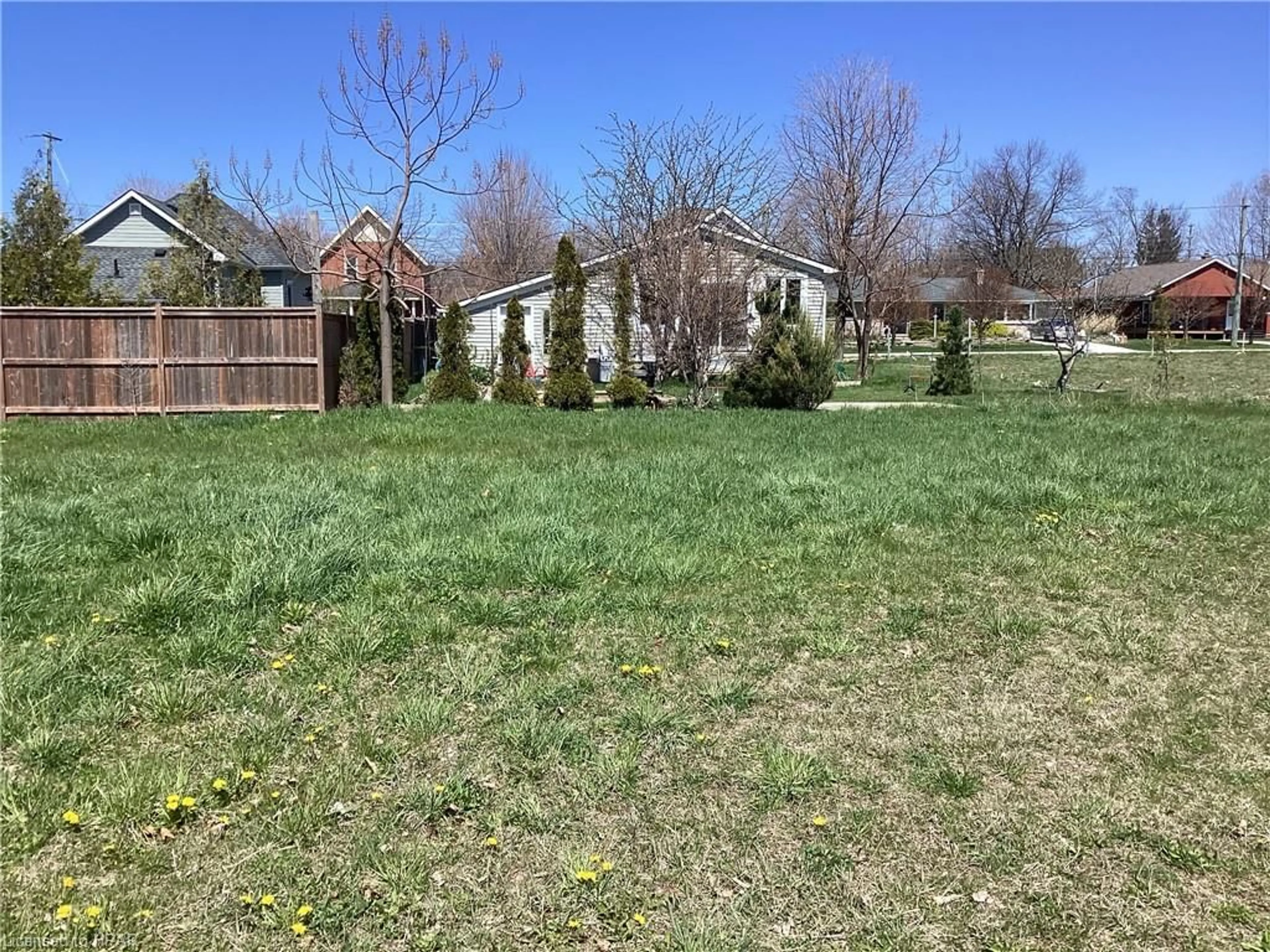 Frontside or backside of a home, the fenced backyard for 165 Elgin Avenue East, Goderich Ontario N7A 1K7