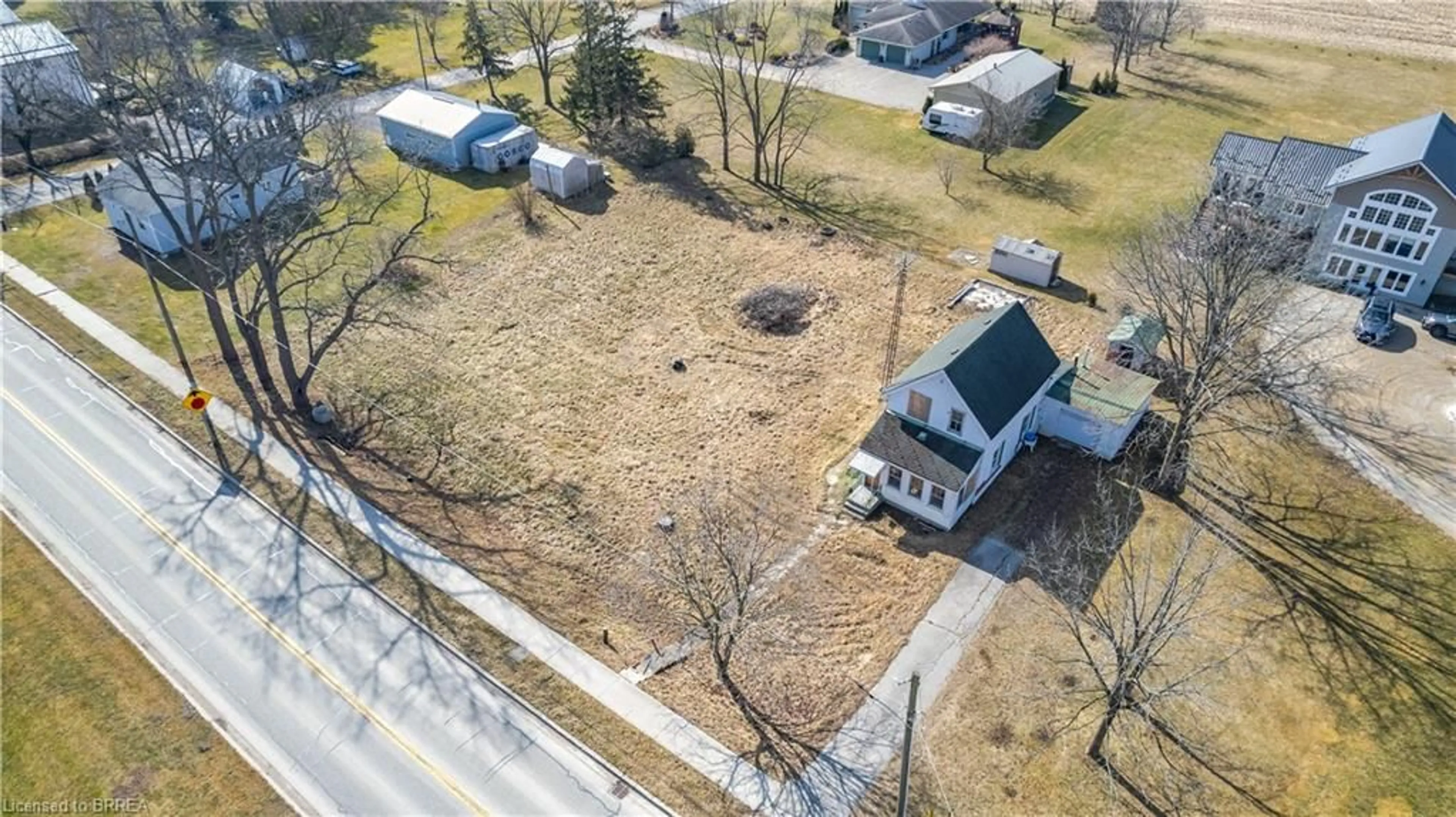 Frontside or backside of a home, the fenced backyard for 9613 Currie Rd, Wallacetown Ontario N0L 2M0