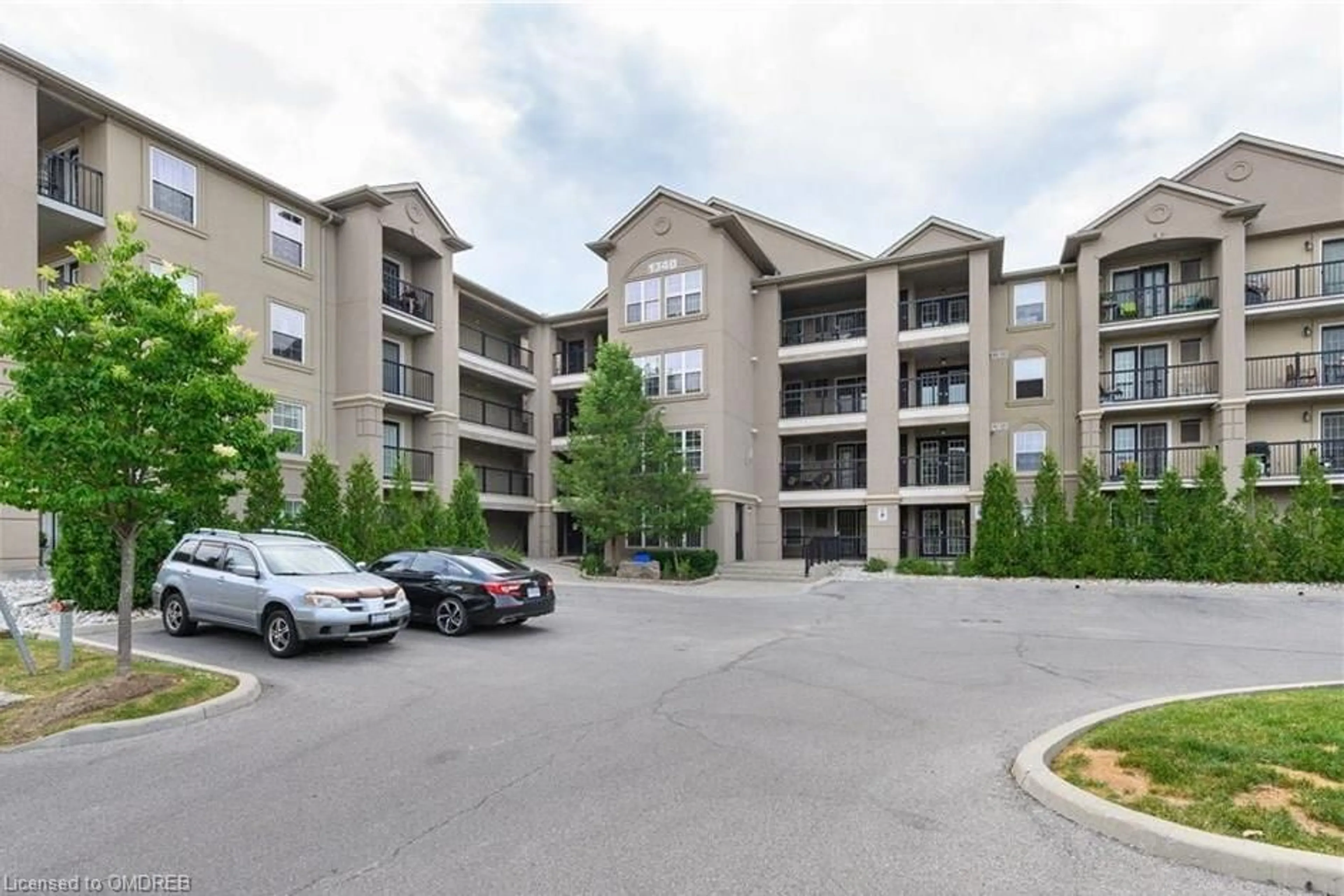 A pic from exterior of the house or condo for 1340 Main St #208, Milton Ontario L9T 7S6