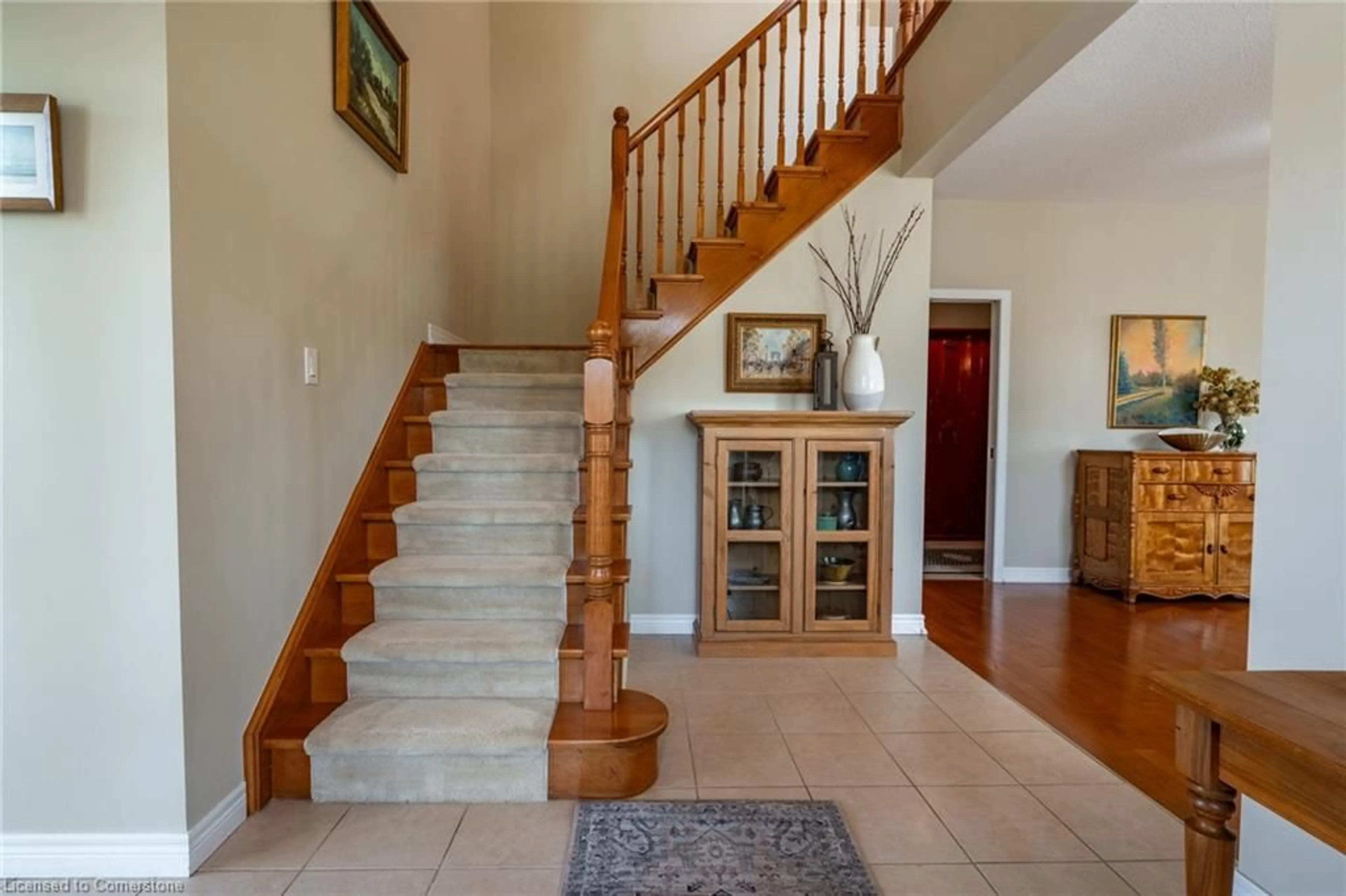 Indoor foyer, wood floors for 55 Landscapes Trail, Ancaster Ontario L9K 0A1