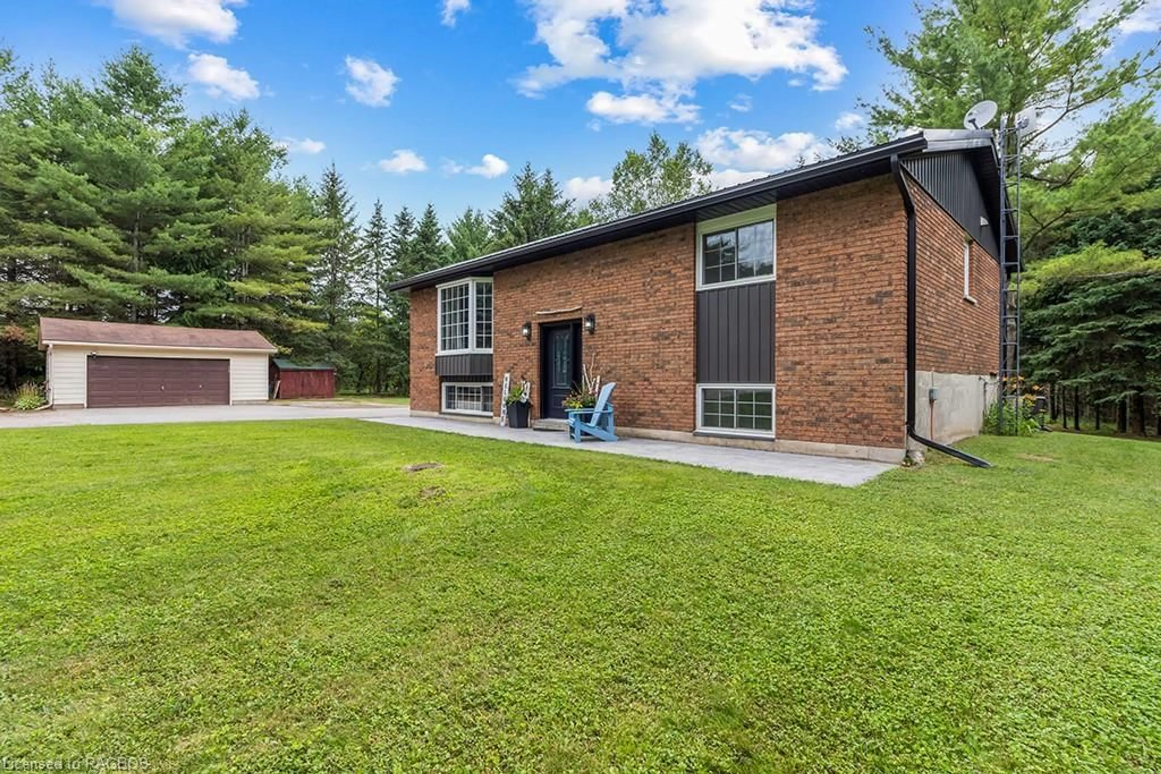 Home with brick exterior material for 703021 Walker Sideroad, Chatsworth Ontario N0H 1G0