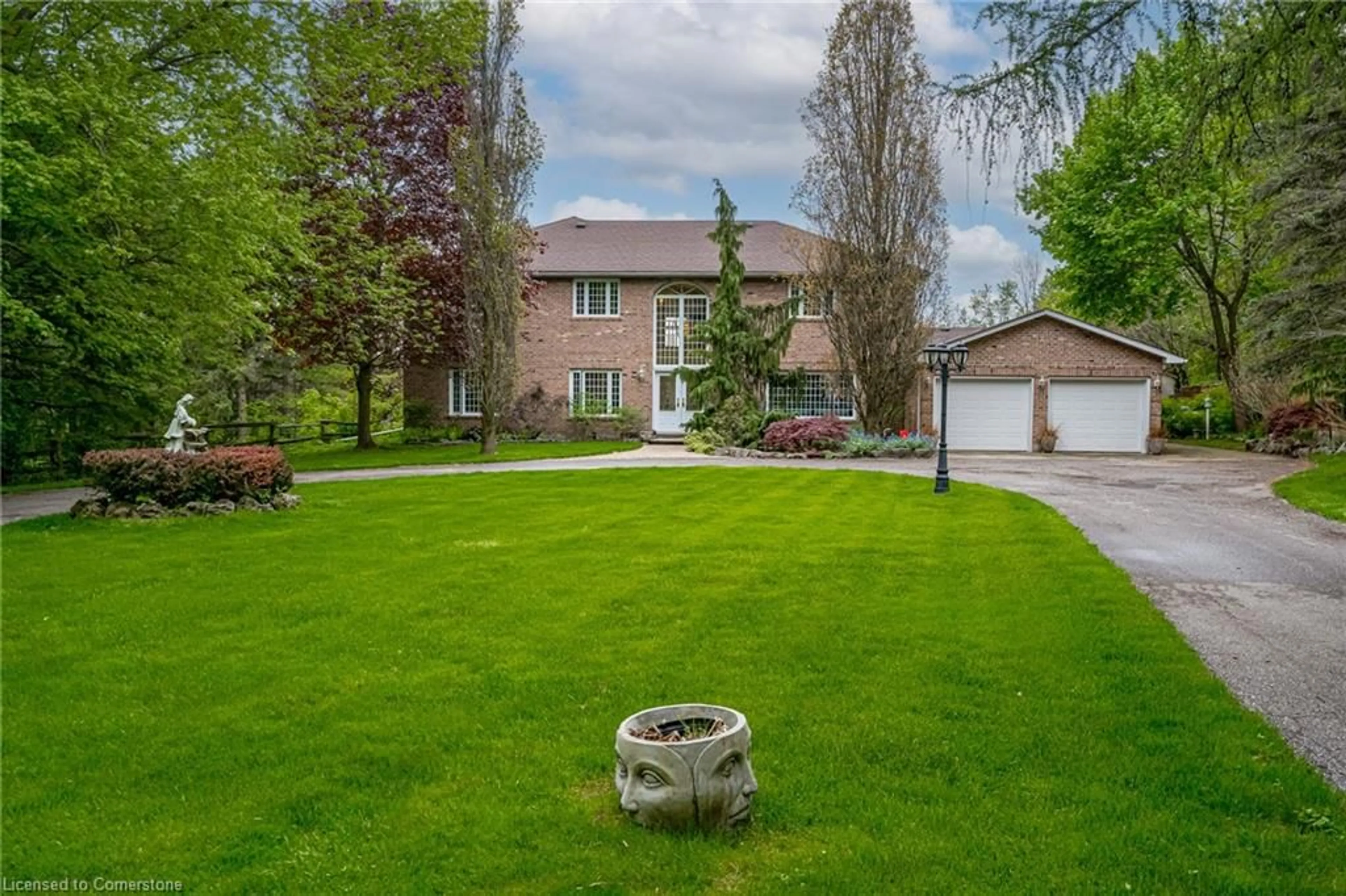 Frontside or backside of a home, the fenced backyard for 57 Kennedy Rd, Caledon Ontario L7C 2M7