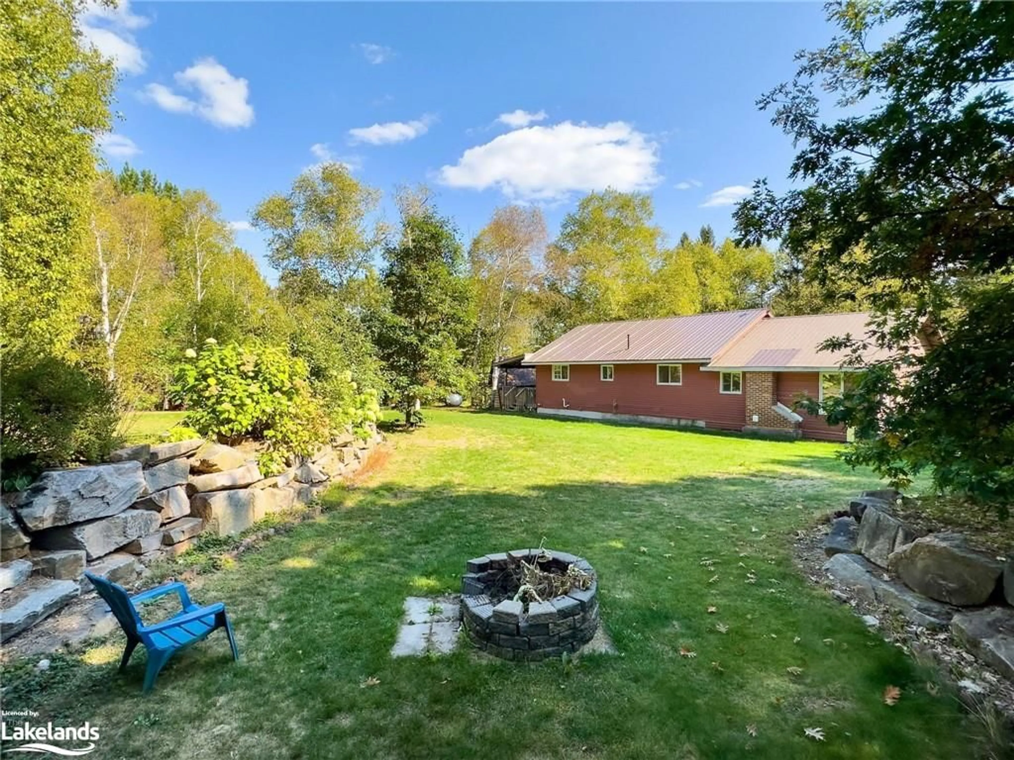 Patio, the fenced backyard for 316 Goreville Rd, South River Ontario P0A 1X0