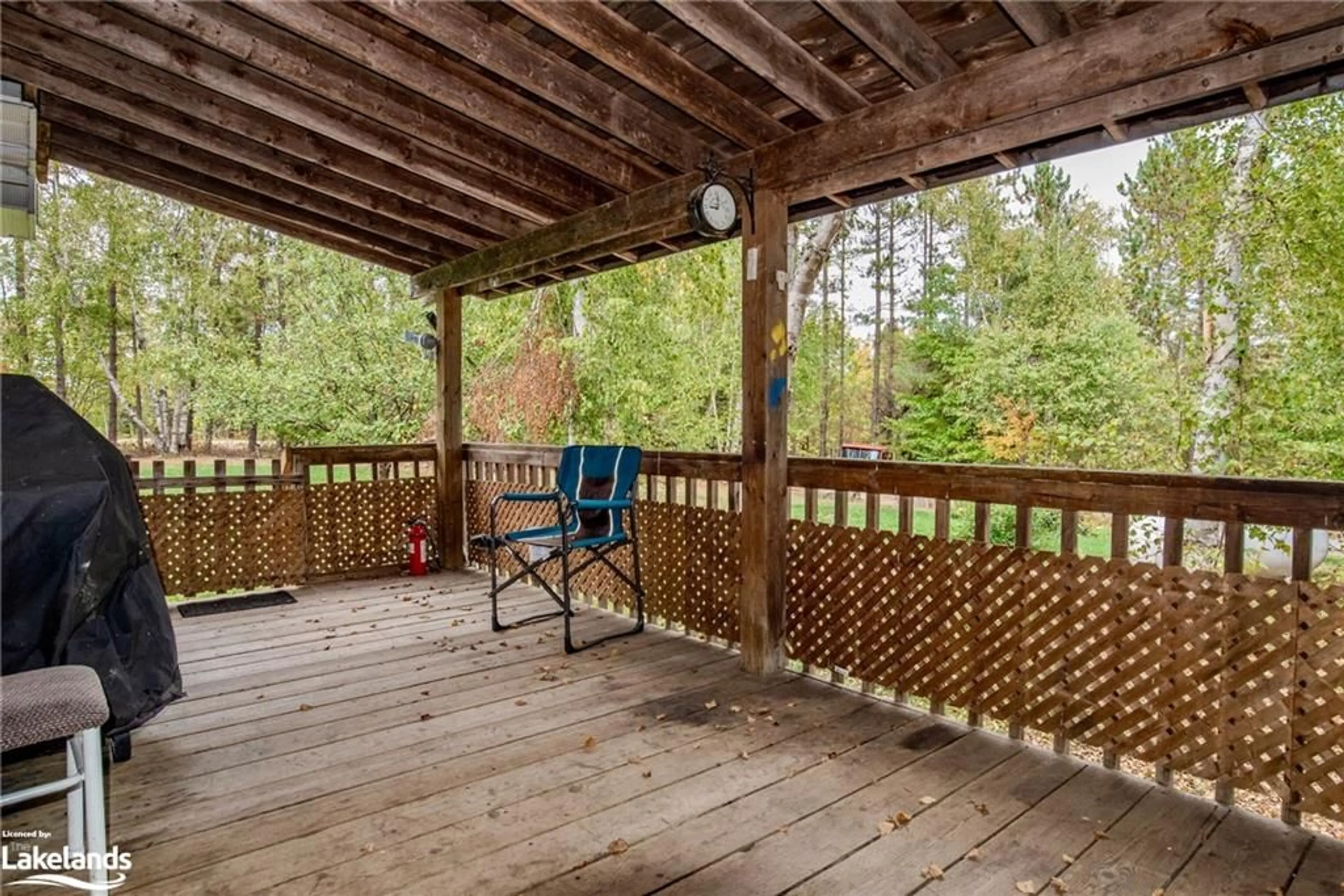 Patio, the fenced backyard for 316 Goreville Rd, South River Ontario P0A 1X0