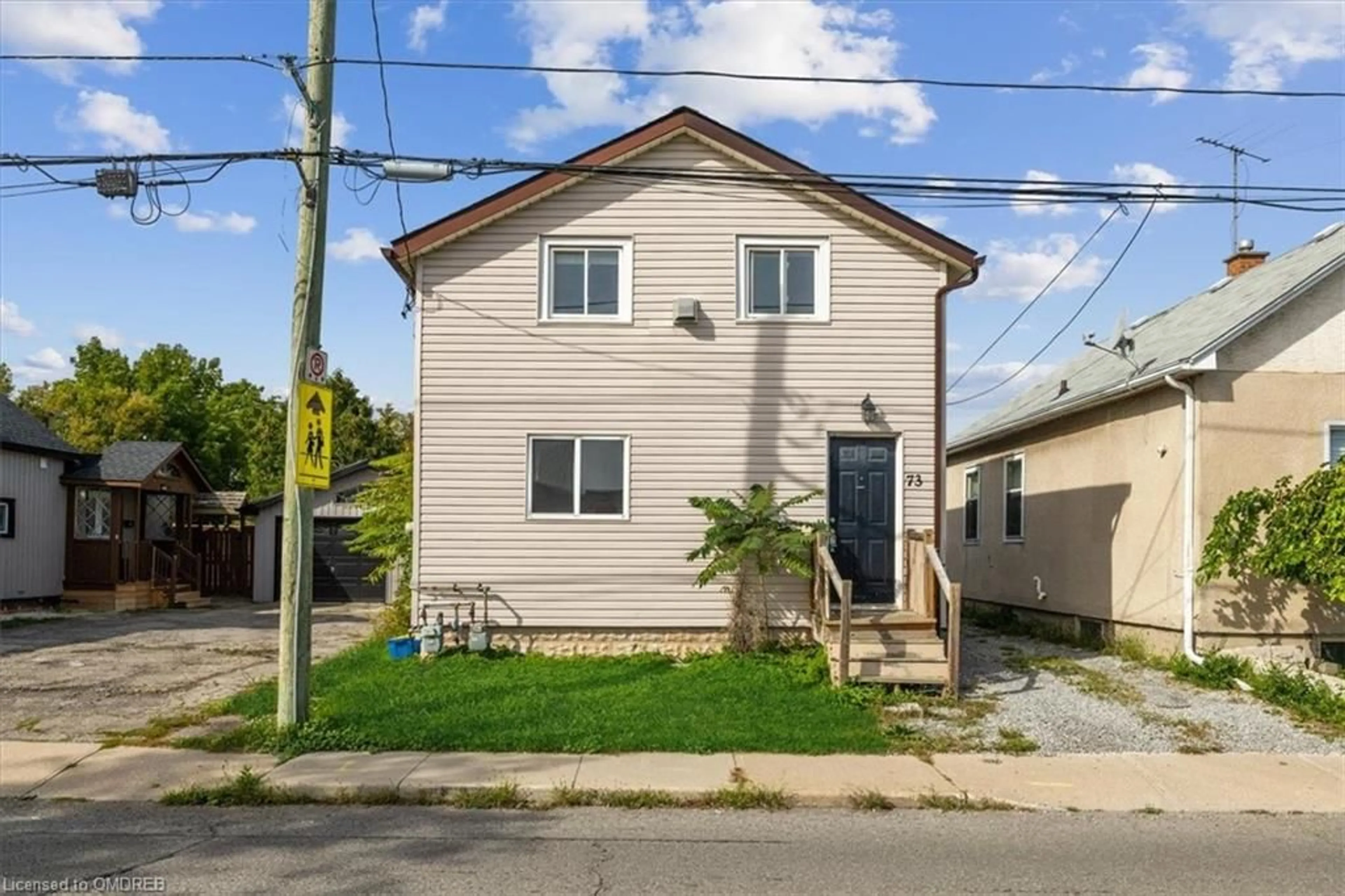 Frontside or backside of a home, cottage for 73 Vine St, St. Catharines Ontario L2R 3X9