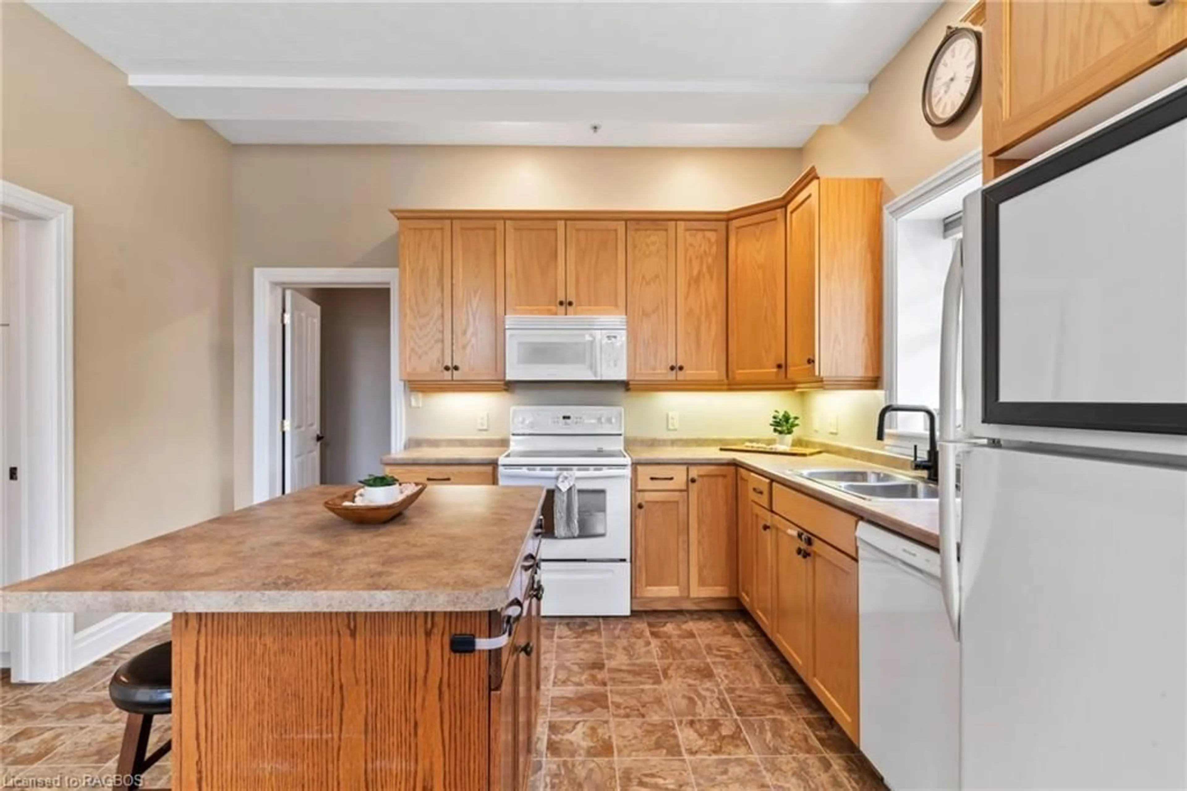 Open concept kitchen for 355 Princess St #1, Shallow Lake Ontario N0H 2K0