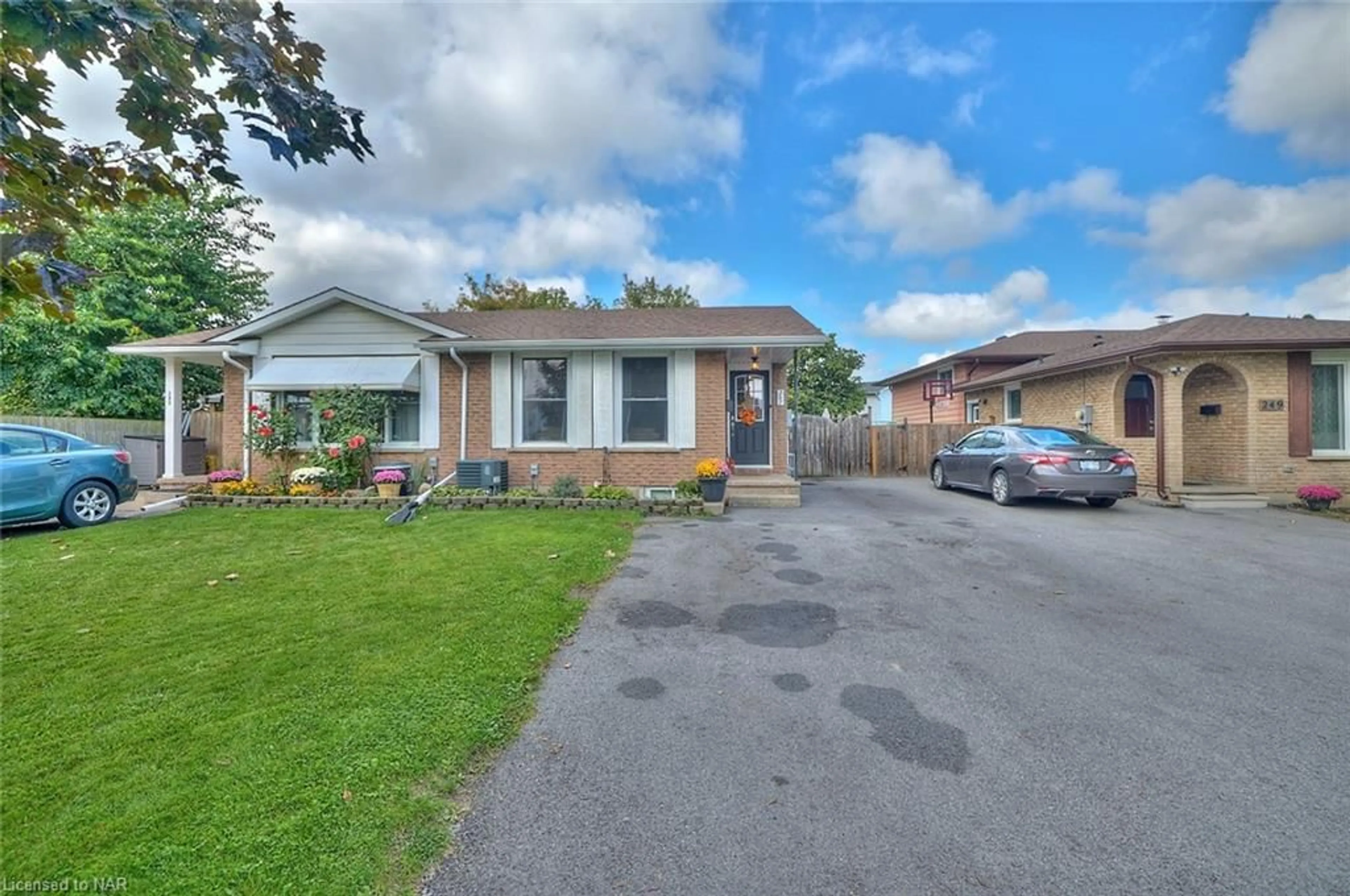 Frontside or backside of a home, the street view for 247 St Augustine Dr, St. Catharines Ontario L2P 3L9