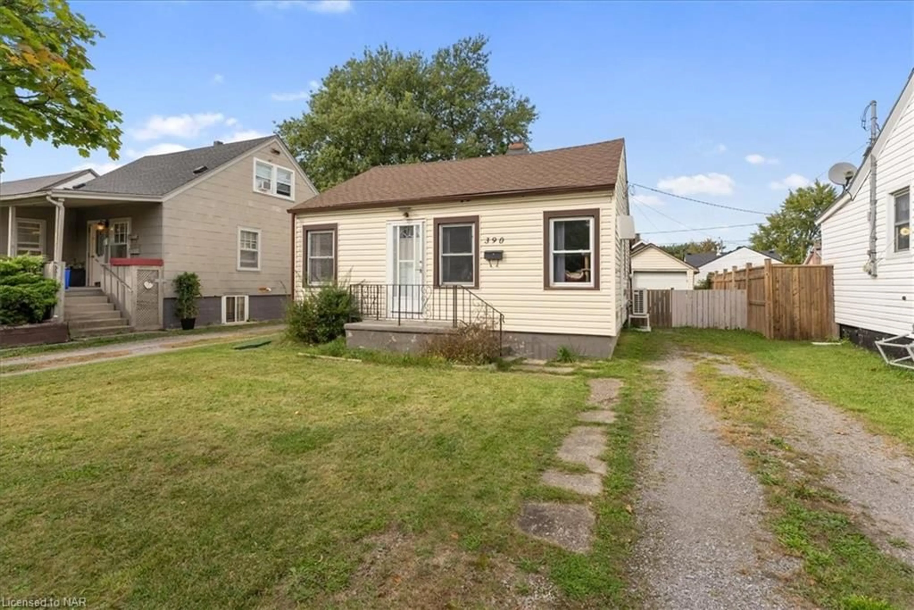 Frontside or backside of a home, the fenced backyard for 390 Gatfield Ave, Welland Ontario L3B 5B2