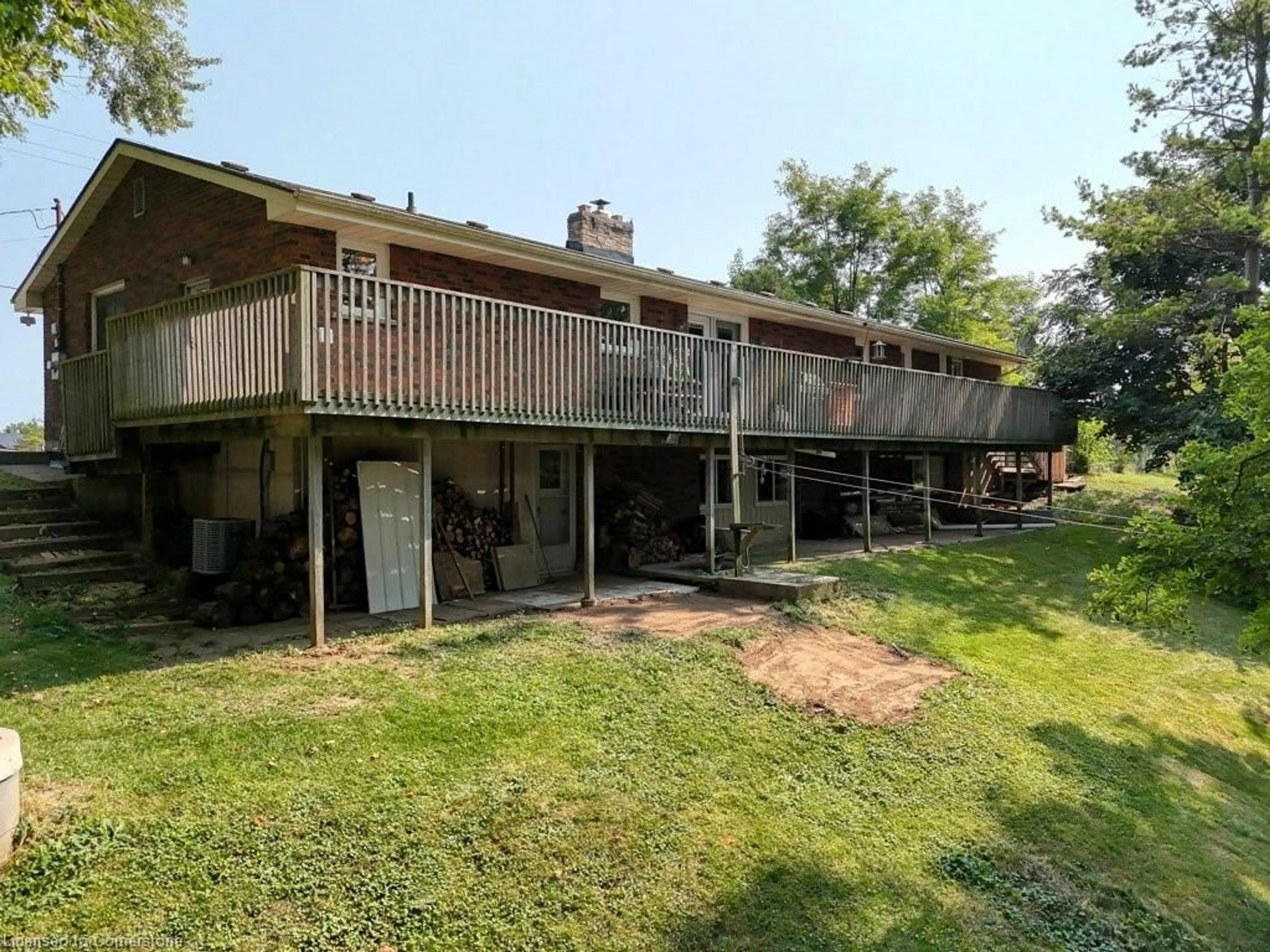 Frontside or backside of a home, the fenced backyard for 50 Jerseyville Rd, Brantford Ontario N3T 5M1