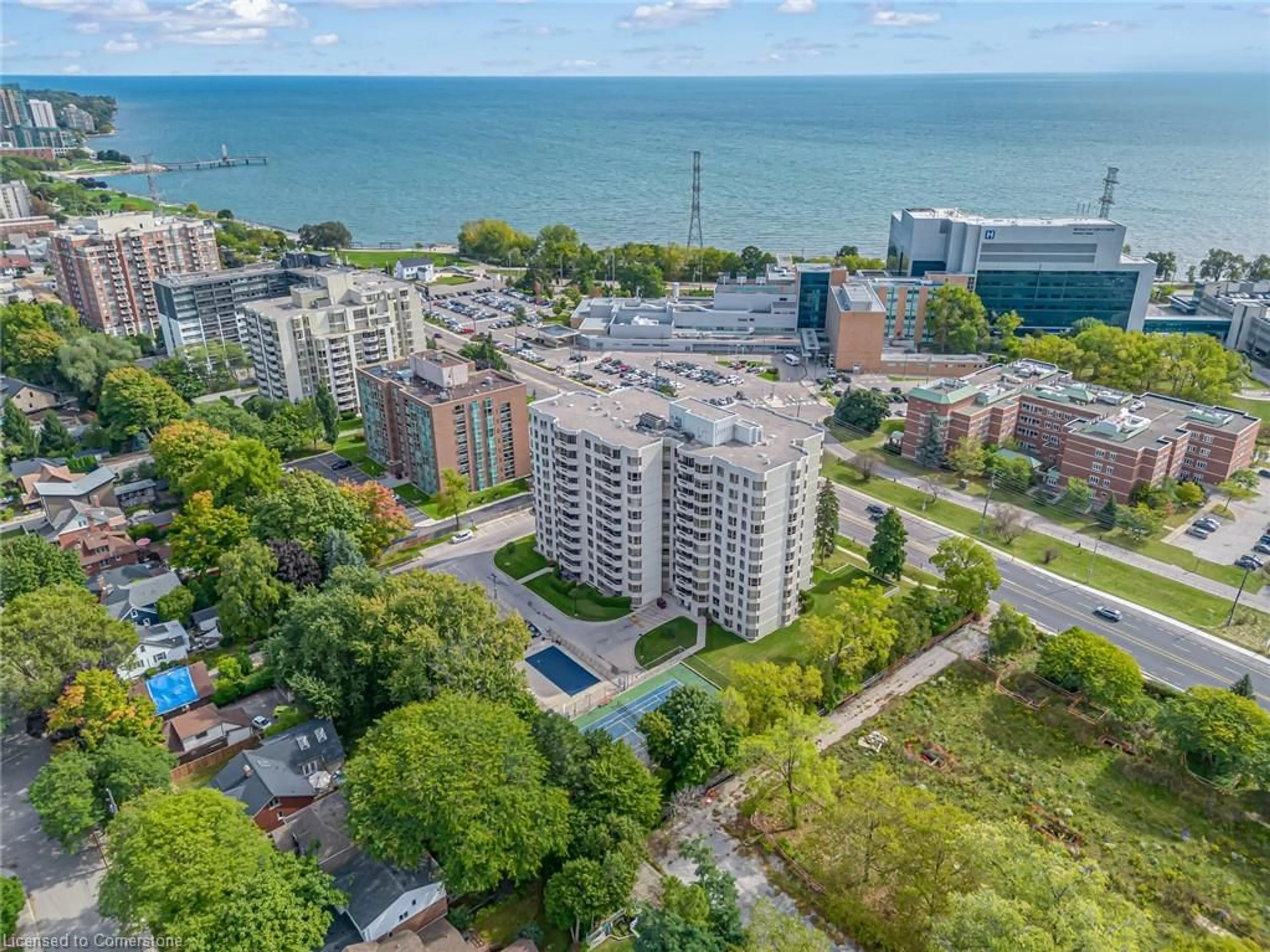 A pic from exterior of the house or condo, the view of city buildings for 1201 North Shore Blvd #606, Burlington Ontario L7S 1Z5