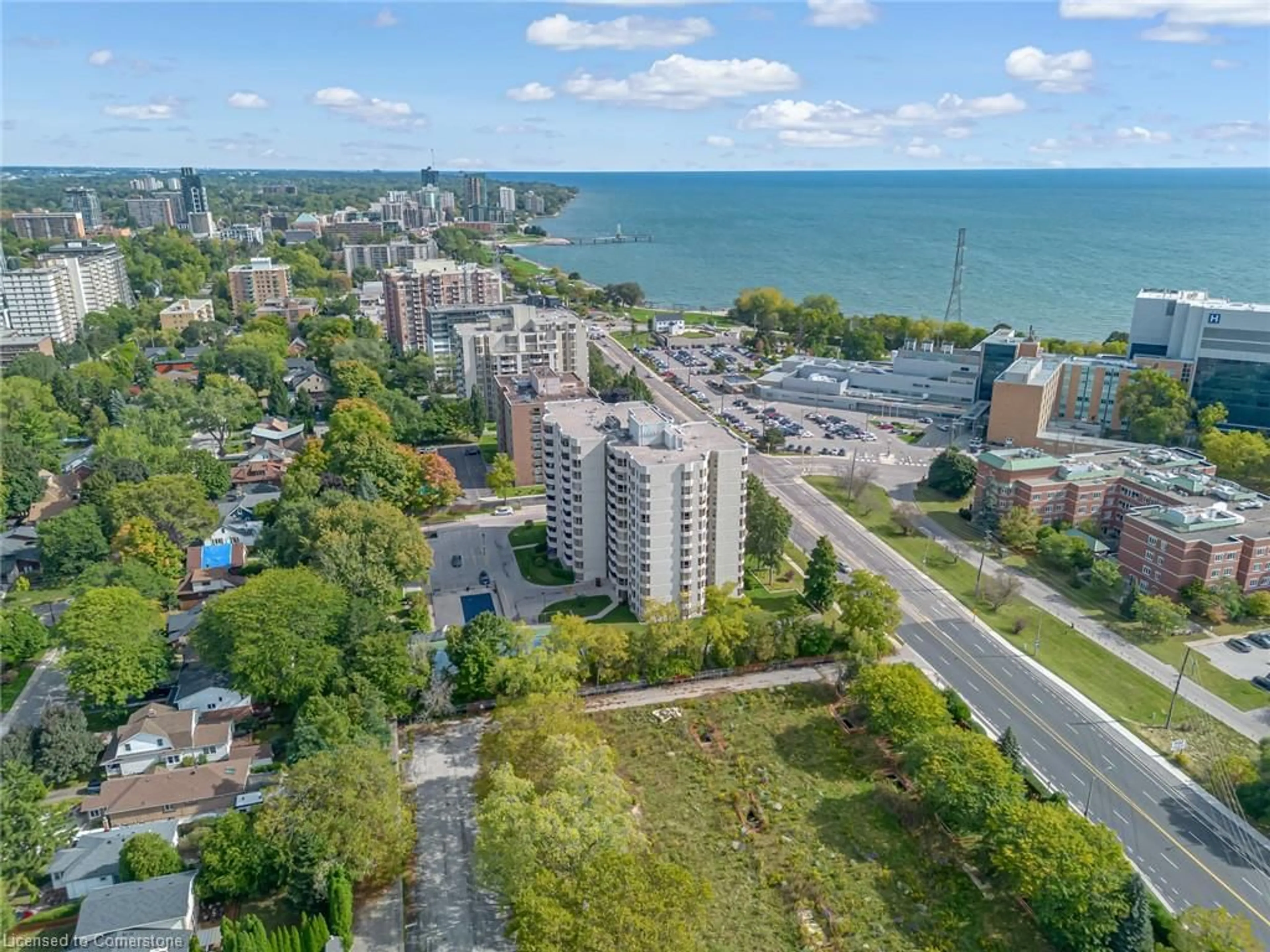 A pic from exterior of the house or condo, the view of city buildings for 1201 North Shore Blvd #606, Burlington Ontario L7S 1Z5