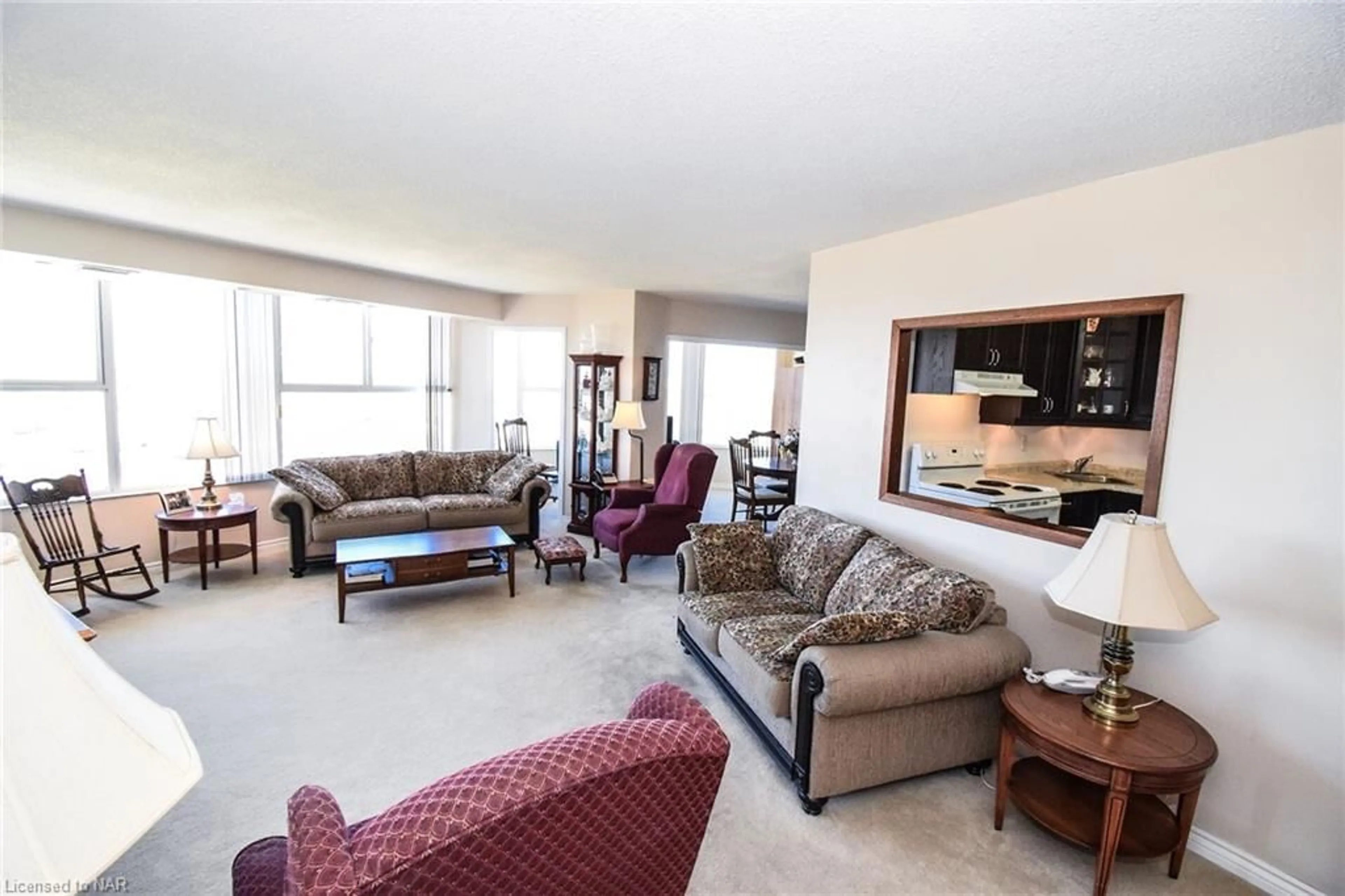 Living room, carpet floors for 7 Gale Cres #1001, St. Catharines Ontario L2R 7M8