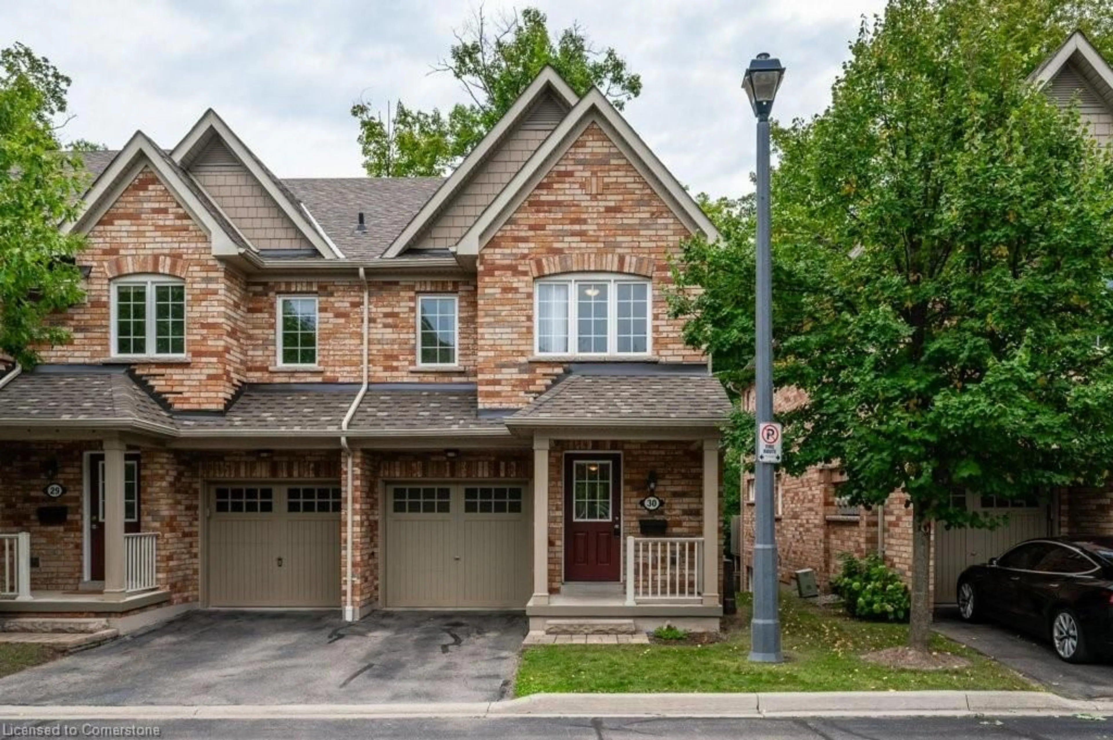 Home with brick exterior material for 233 Duskywing Way #30, Oakville Ontario L6L 0C5