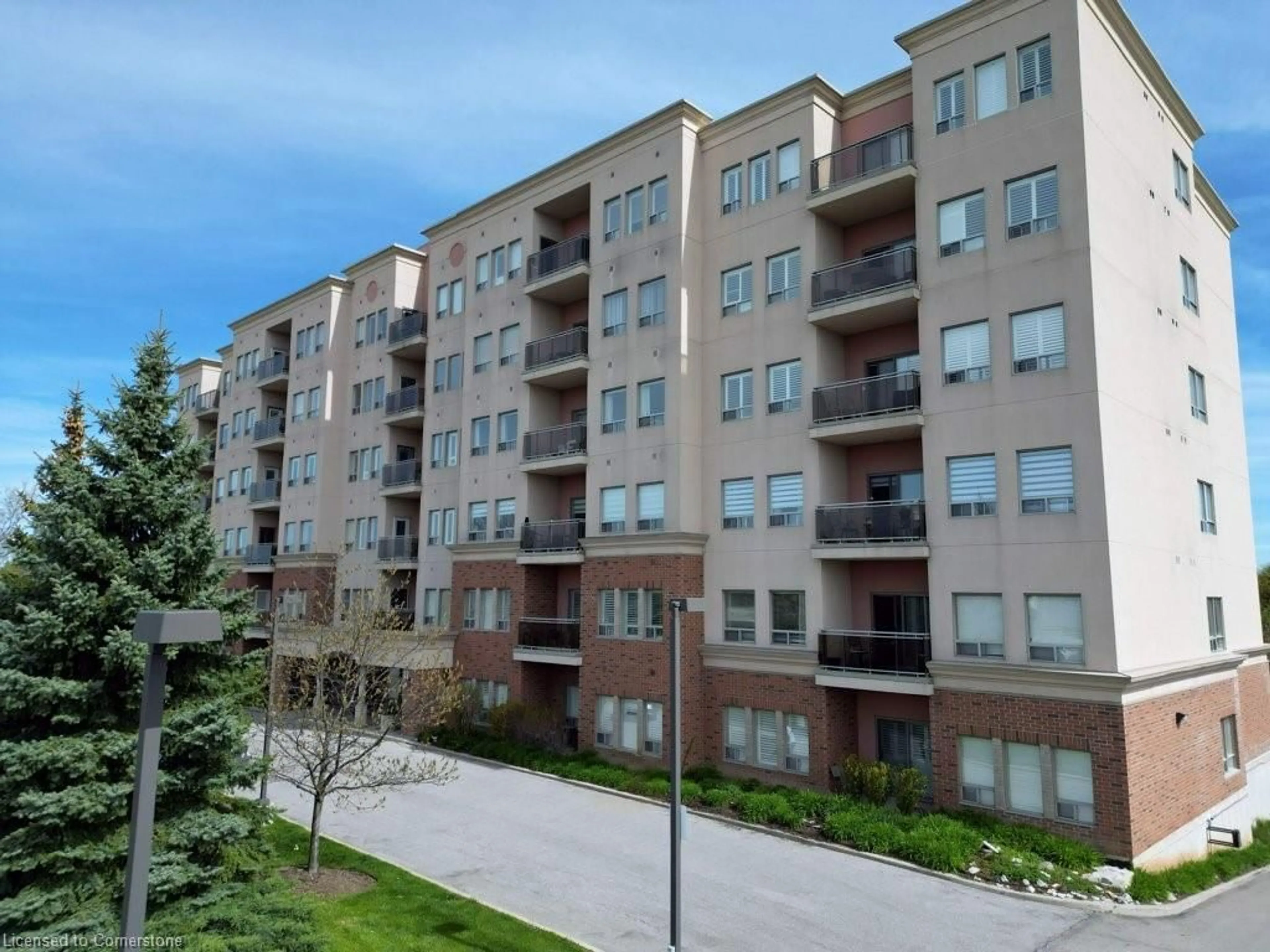 A pic from exterior of the house or condo for 1499 Nottinghill Gate #207, Oakville Ontario L6M 5G1