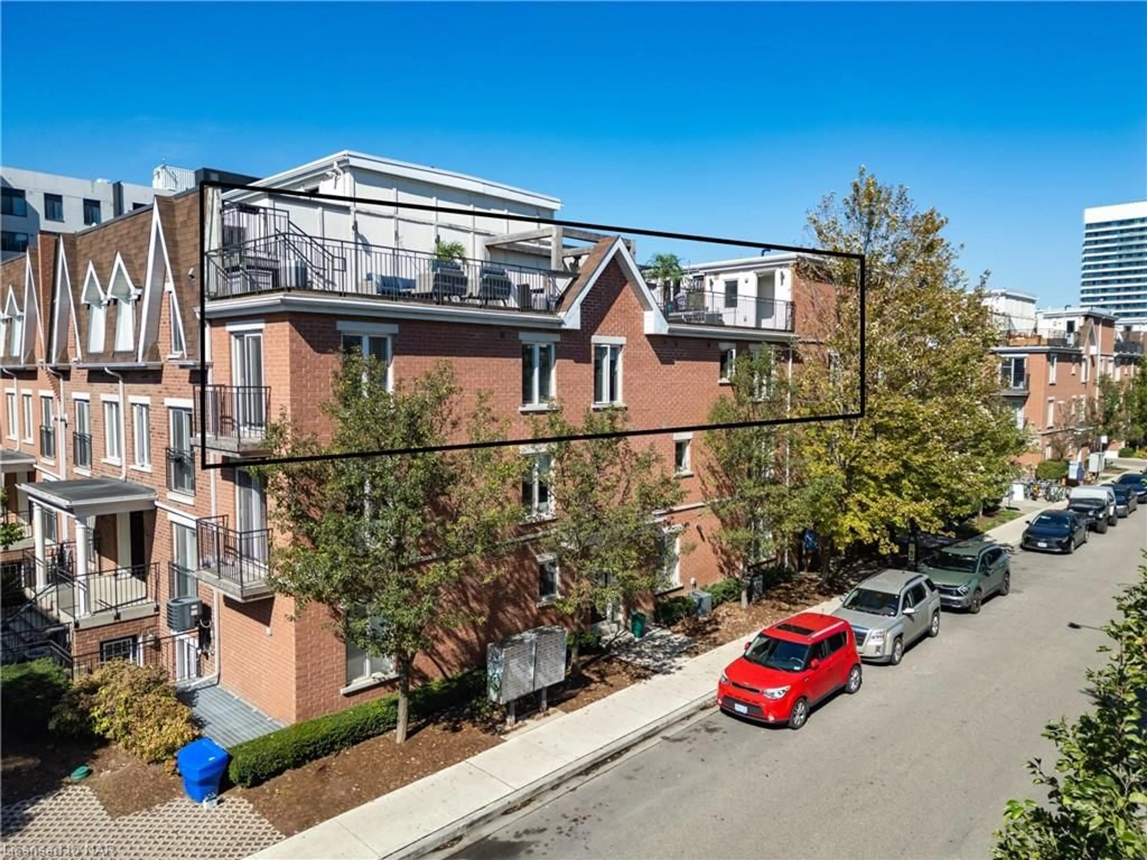 A pic from exterior of the house or condo, the street view for 12 Laidlaw St #833C, Toronto Ontario M6K 1X2
