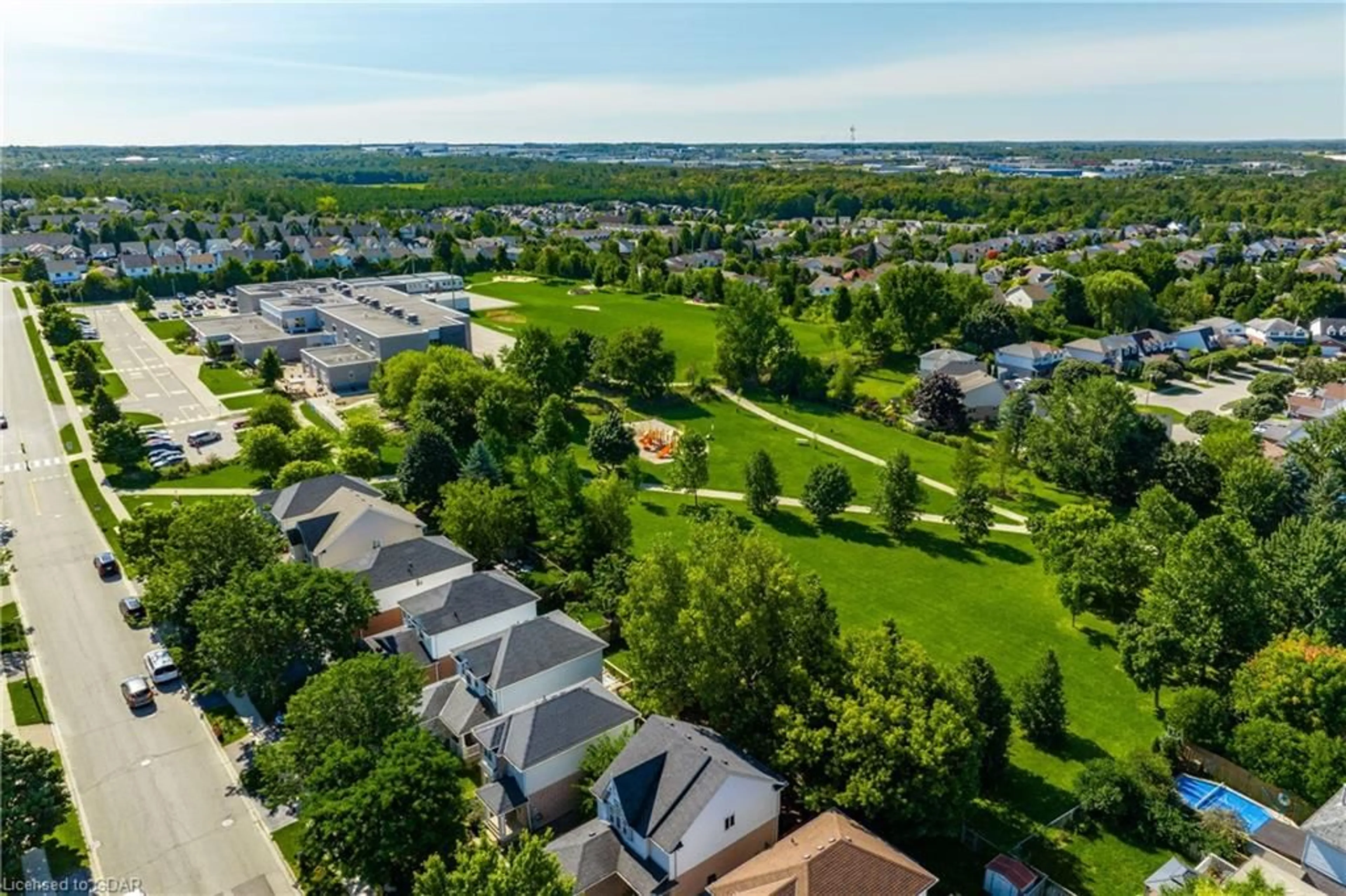 A pic from exterior of the house or condo, the fenced backyard for 149 Rickson Ave, Guelph Ontario N1G 4Y3