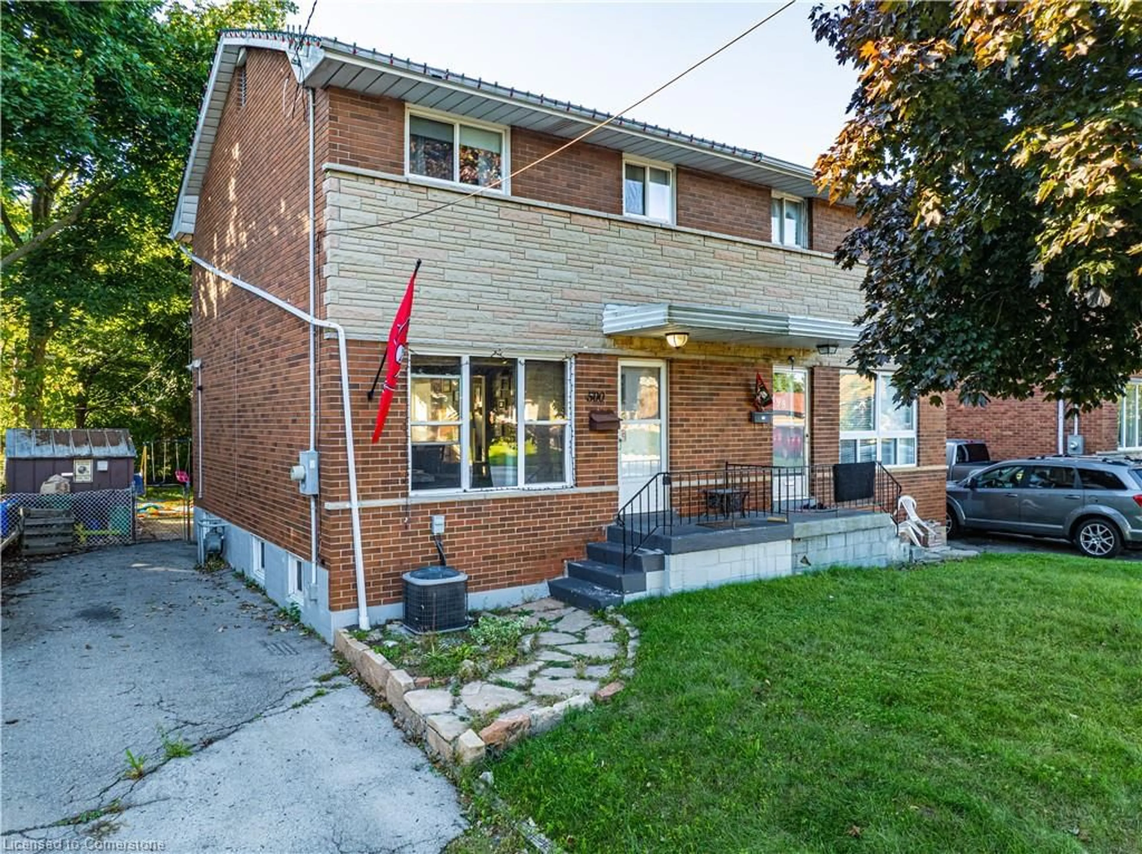 Frontside or backside of a home, the fenced backyard for 500 Upper Kenilworth Ave, Hamilton Ontario L8T 4G8