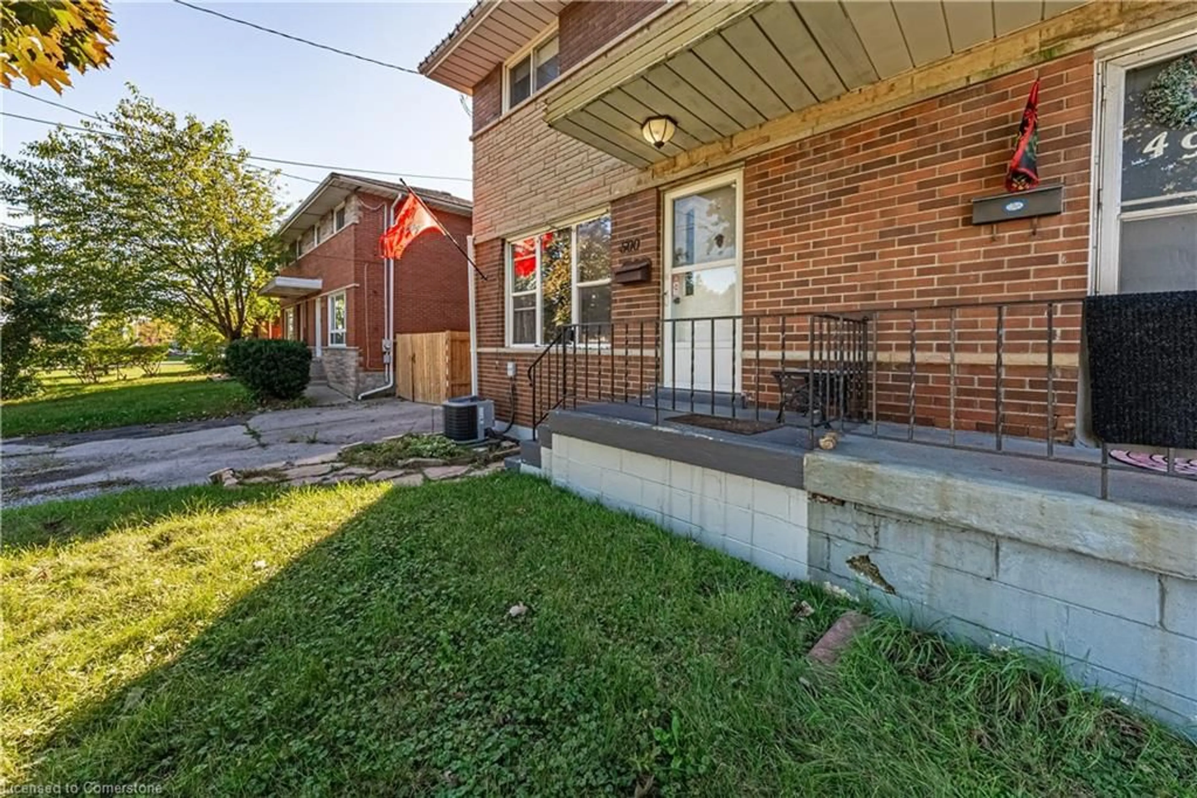 Frontside or backside of a home, the fenced backyard for 500 Upper Kenilworth Ave, Hamilton Ontario L8T 4G8