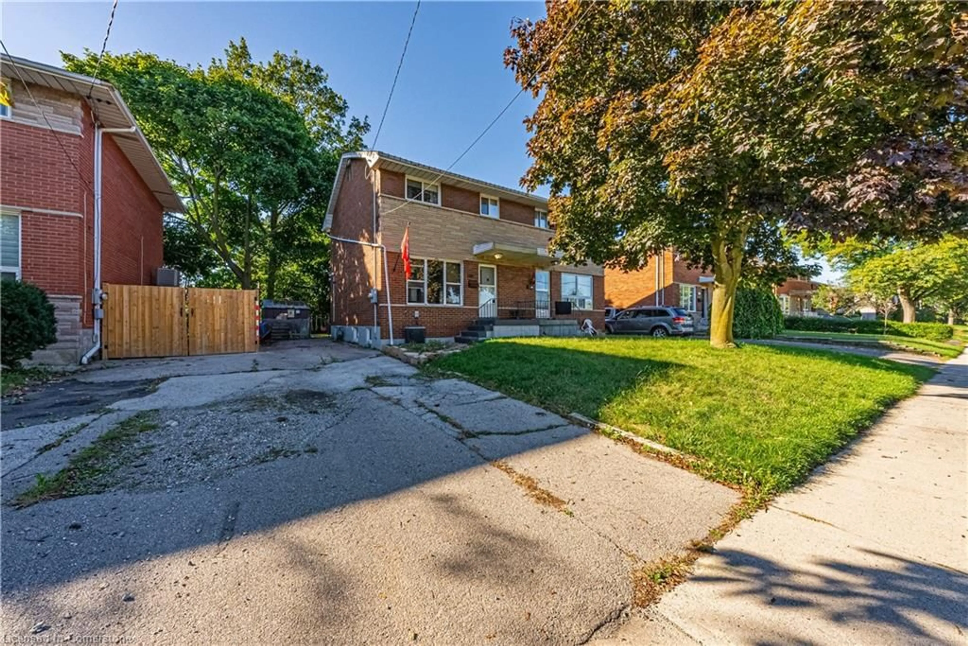 A pic from exterior of the house or condo, the fenced backyard for 500 Upper Kenilworth Ave, Hamilton Ontario L8T 4G8