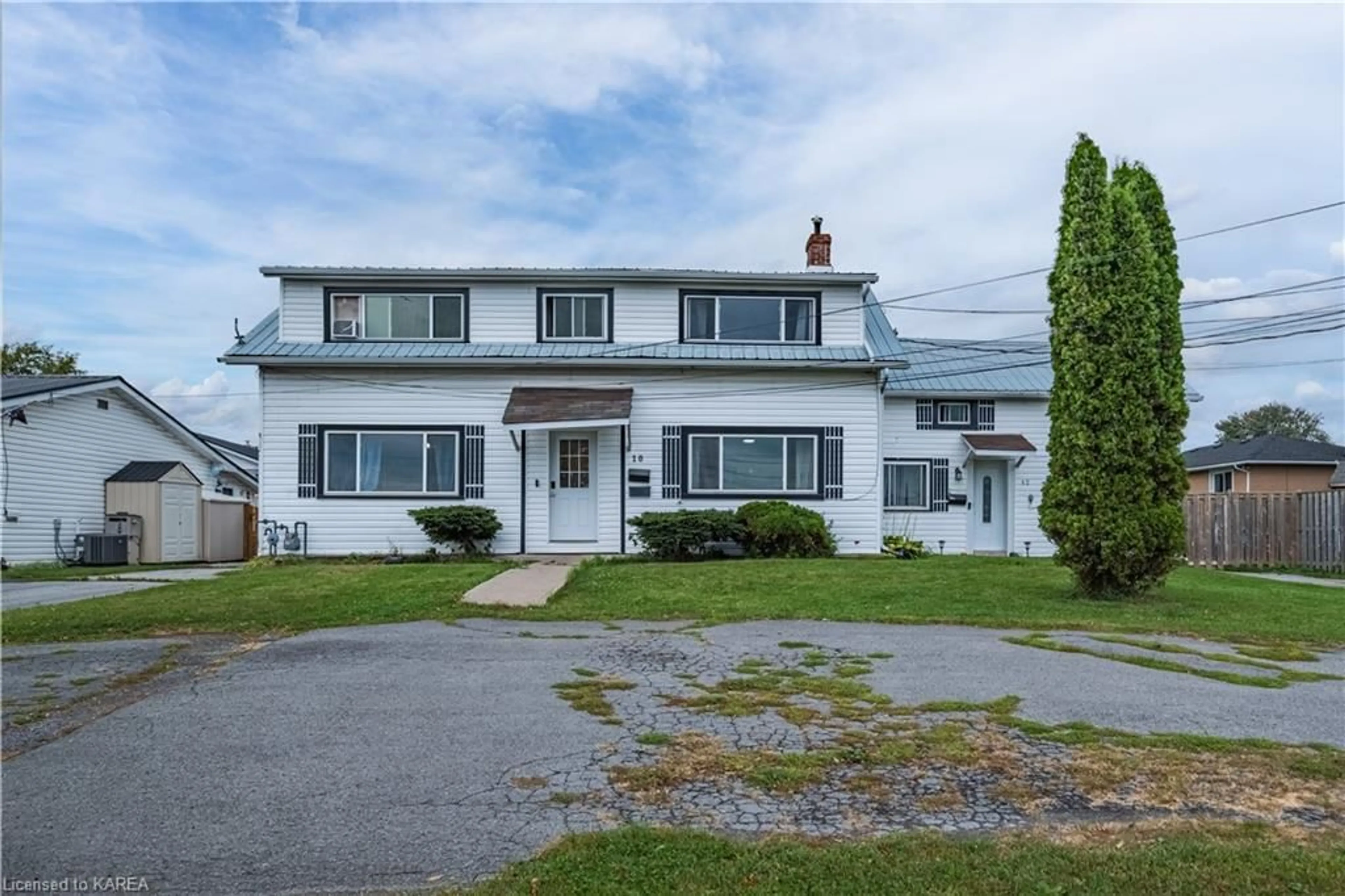 Frontside or backside of a home, the front or back of building for 10-12 Manitou Cres, Amherstview Ontario K7N 1B6