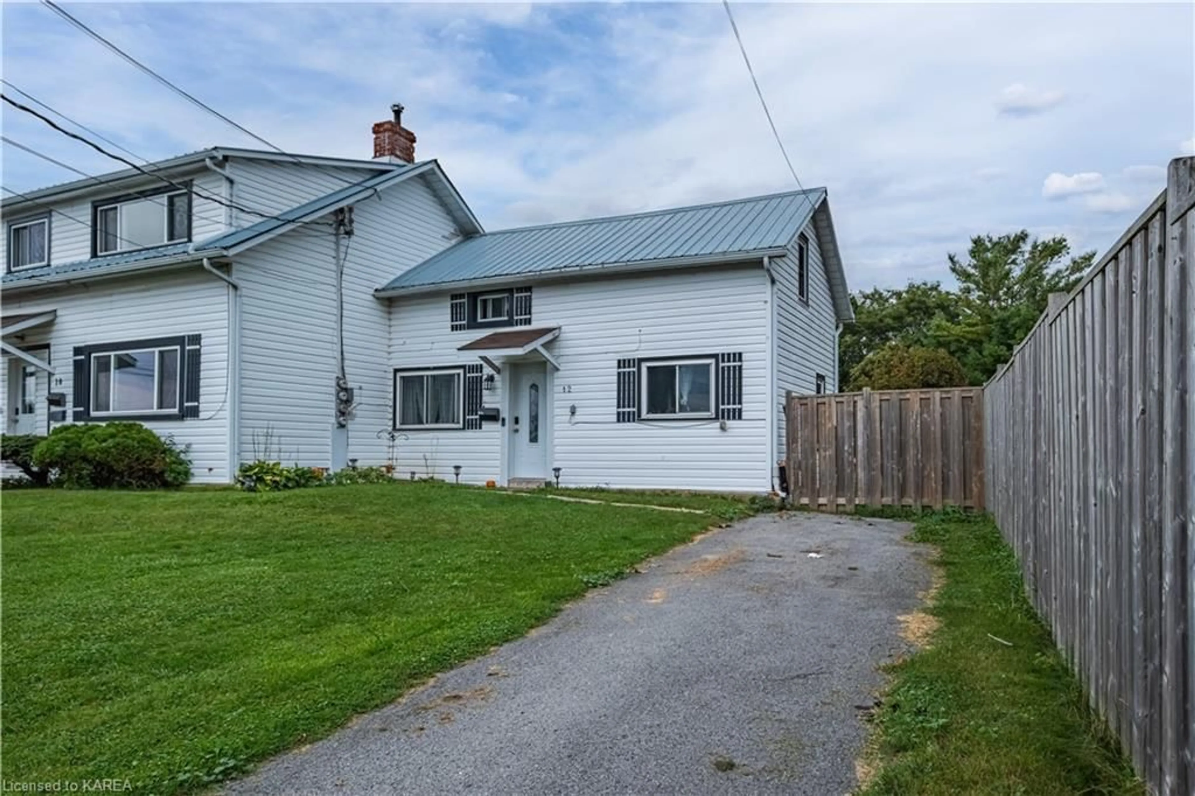 Frontside or backside of a home, cottage for 10-12 Manitou Cres, Amherstview Ontario K7N 1B6