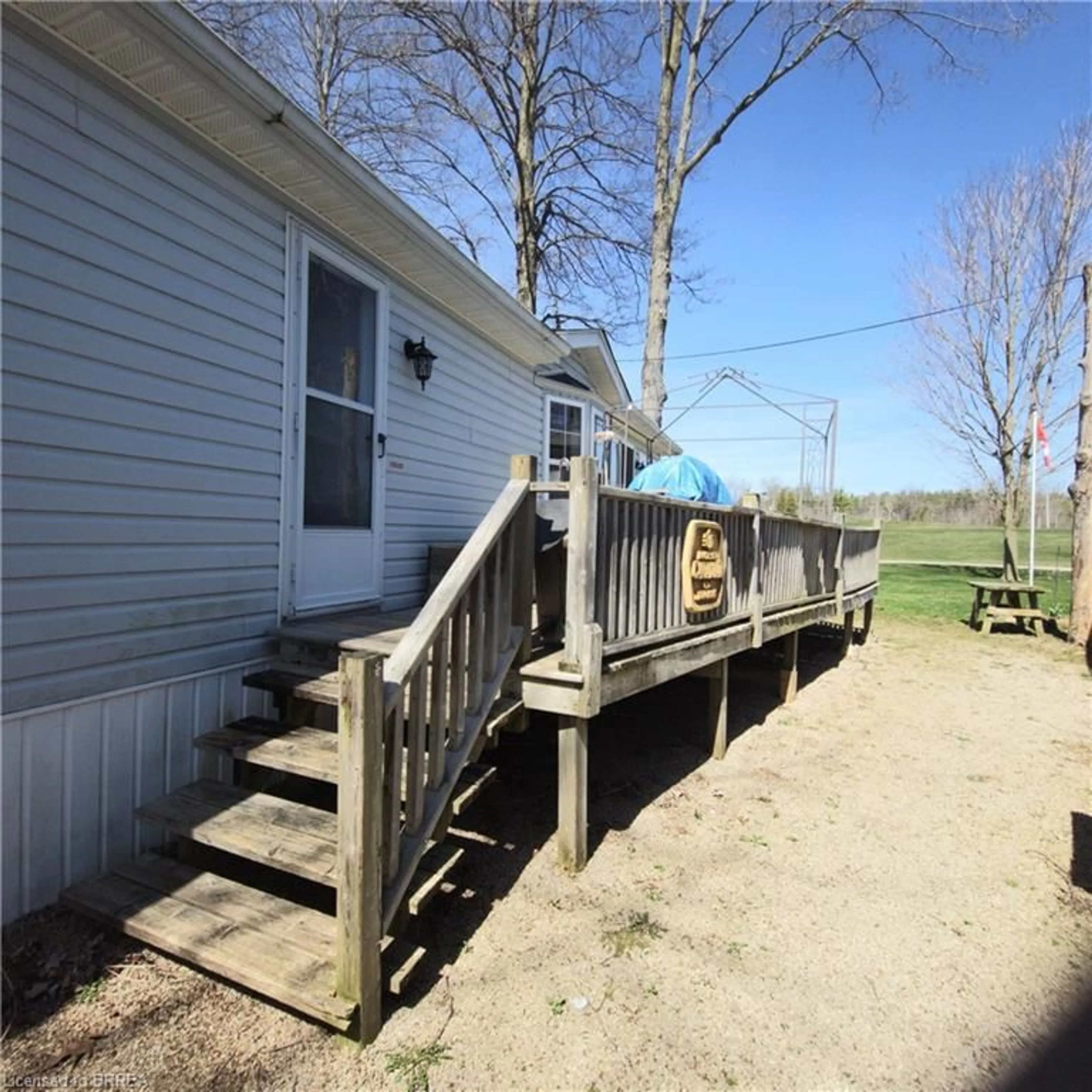 Frontside or backside of a home, the fenced backyard for 117 Otto Rd, Freelton Ontario L0R 1K0
