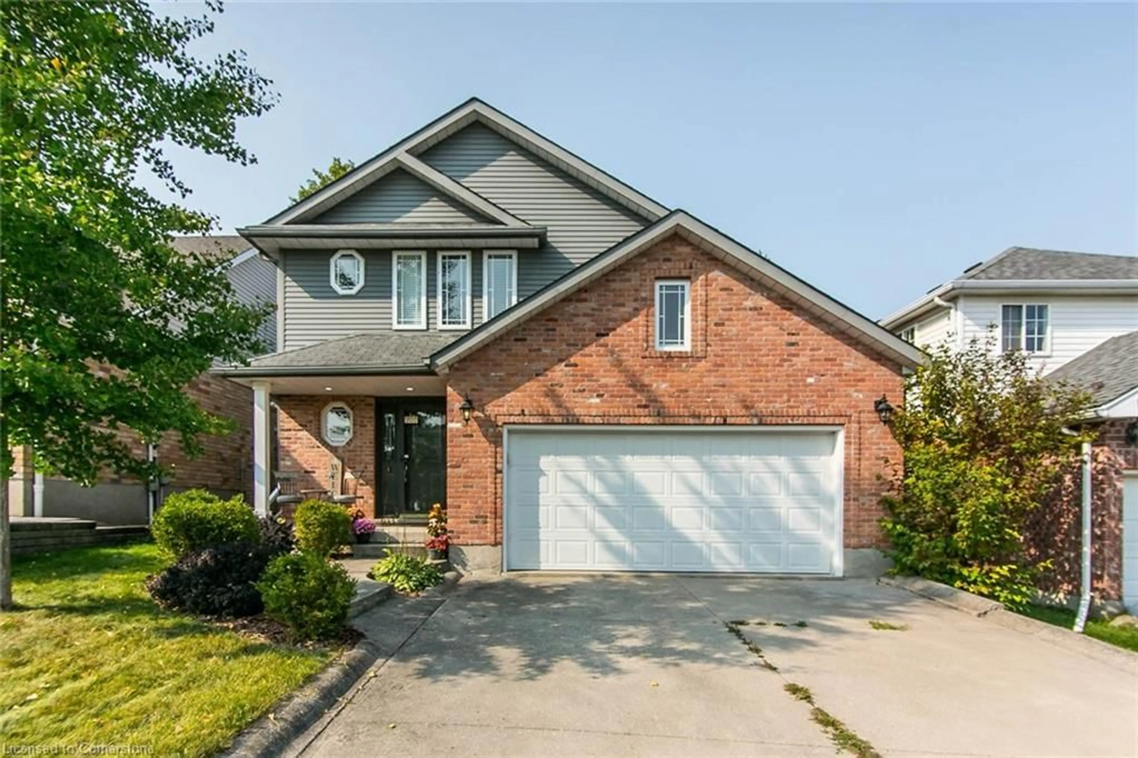 Home with brick exterior material for 707 Beechwood Dr, Waterloo Ontario N2T 2M7