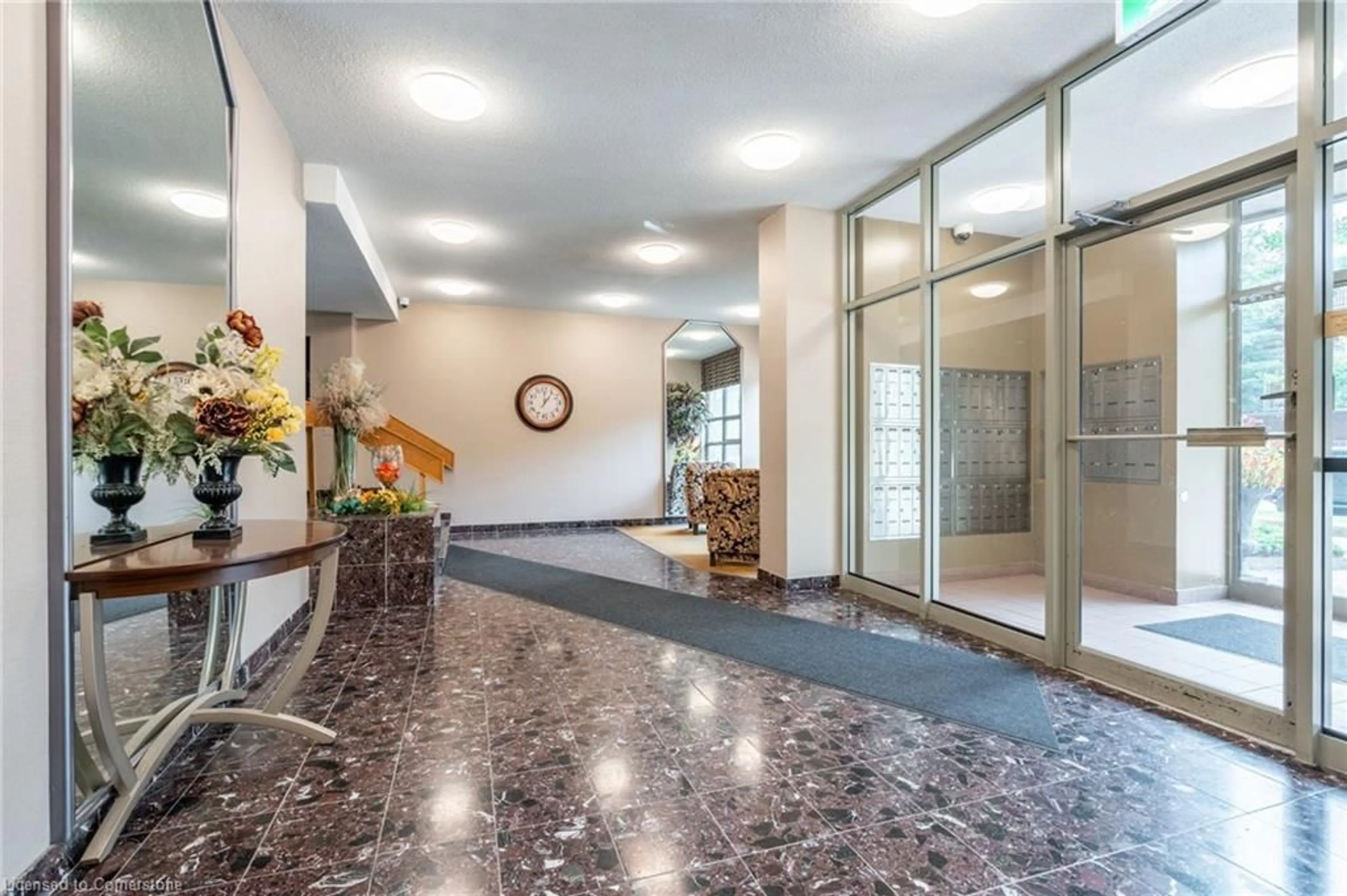 Indoor lobby, ceramic floors for 8 Village Green Blvd #507, Stoney Creek Ontario L8G 5B8