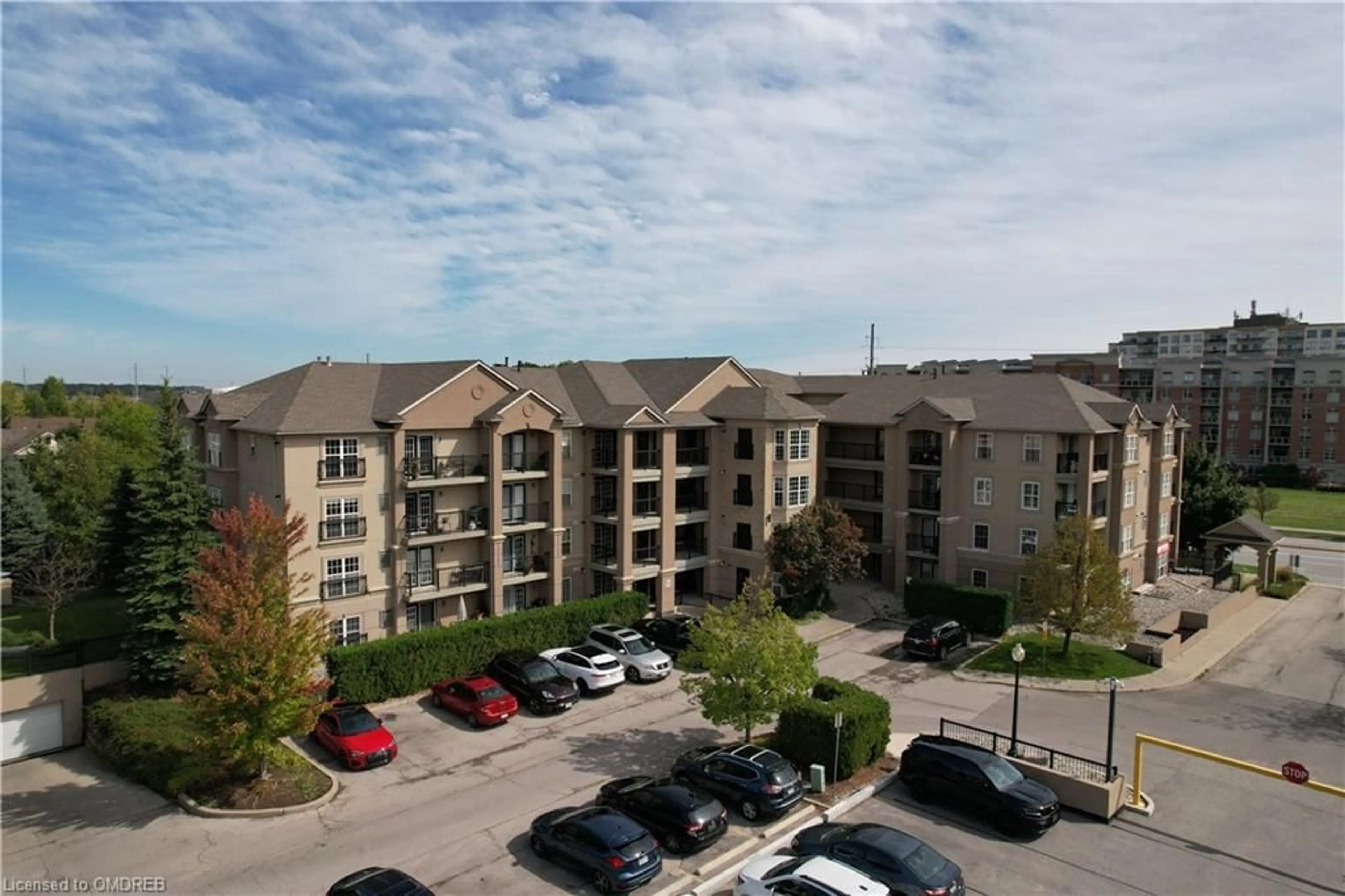 A pic from exterior of the house or condo, the front or back of building for 2055 Appleby Line #410, Burlington Ontario L7L 7H1