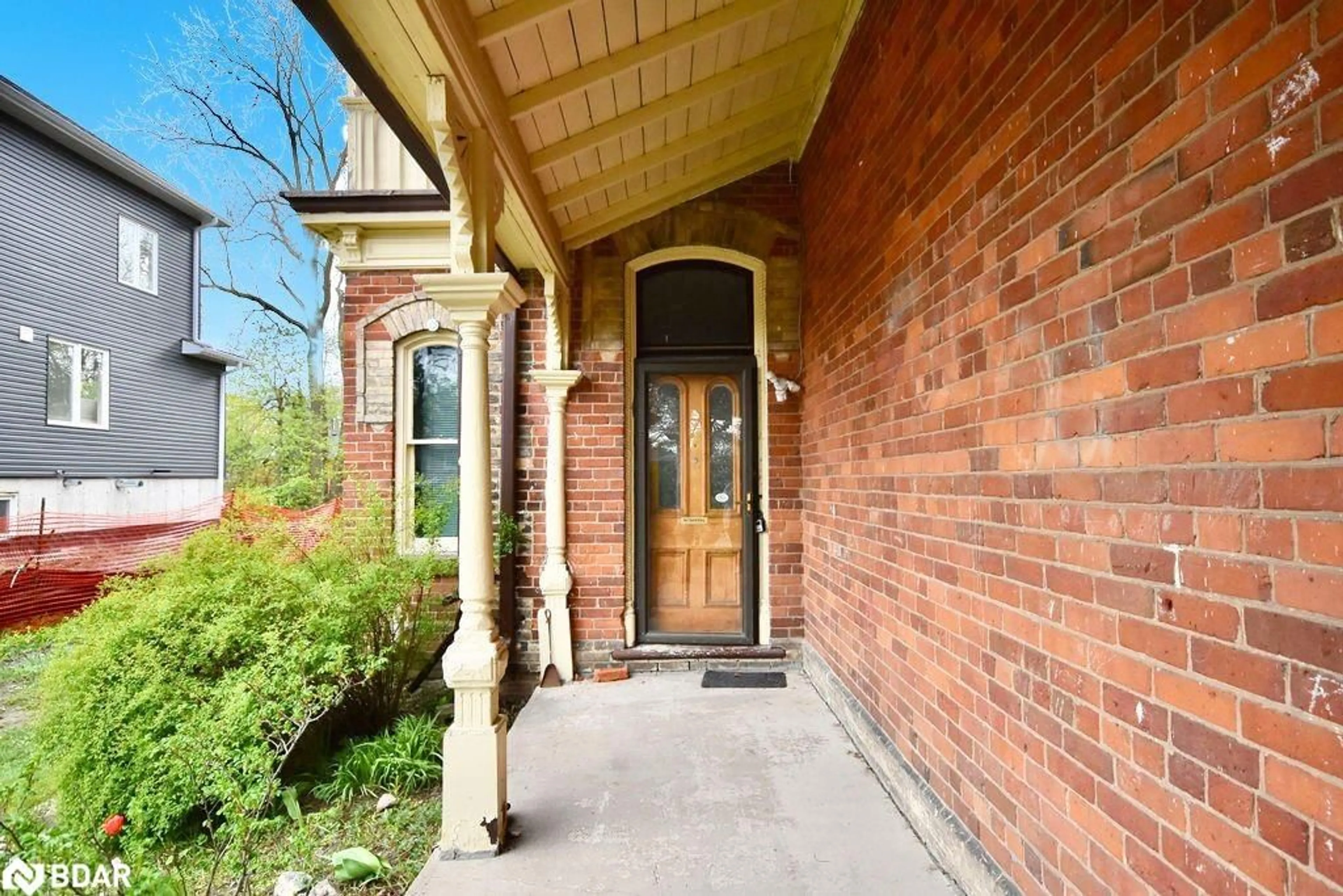 Home with brick exterior material for 102 Peel Street, Barrie Ontario L4M 3L4