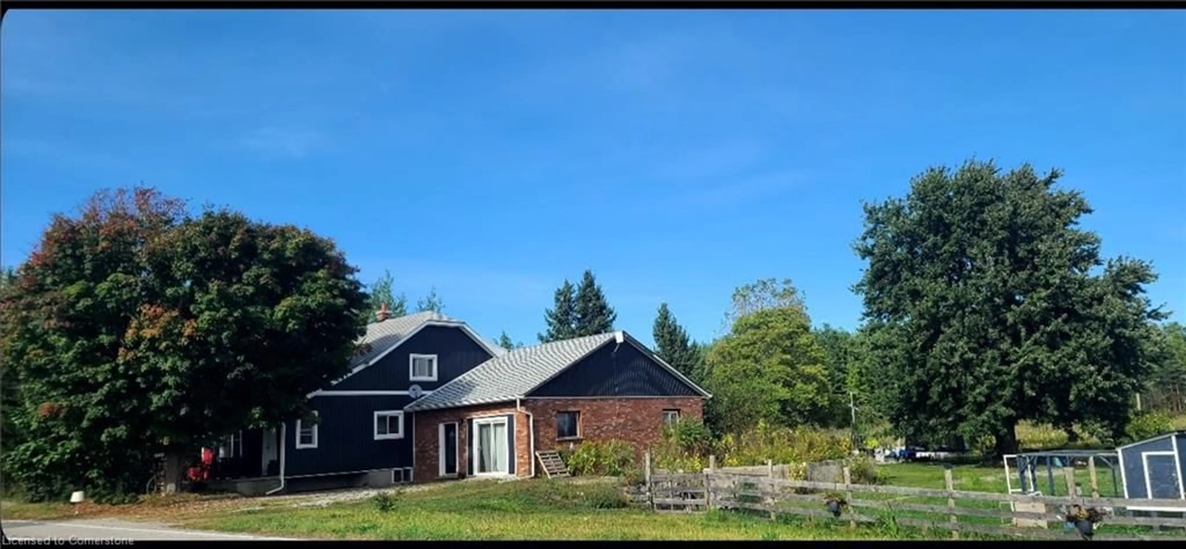 Frontside or backside of a home, the fenced backyard for 940 Hutchinson Rd Rd, Lowbanks Ontario N0A 1K0