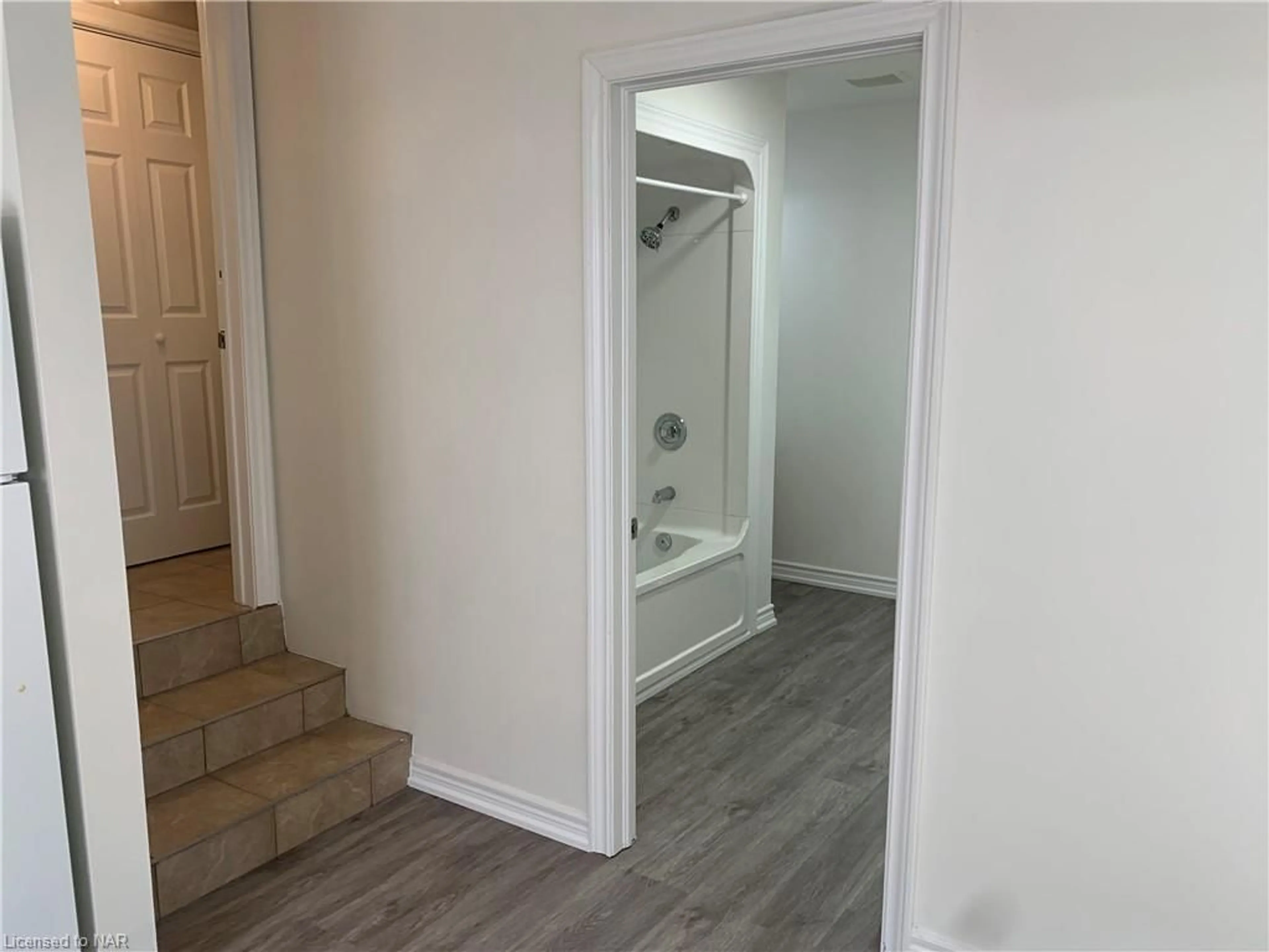 Indoor entryway, wood floors for 114 Lake St, St. Catharines Ontario L2R 5X8