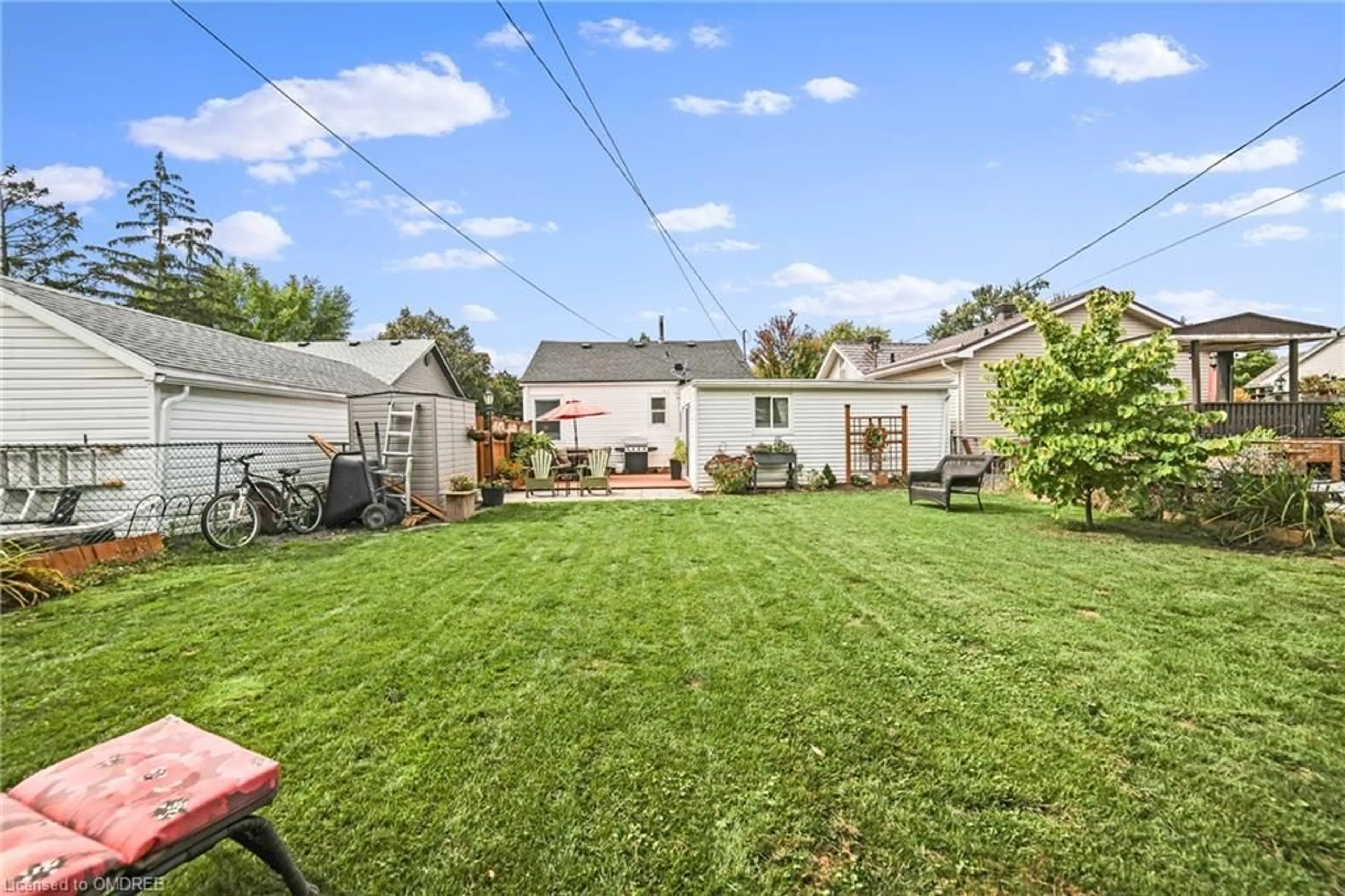 Frontside or backside of a home, the fenced backyard for 101 Mcarthur Ave, Welland Ontario L3B 2J6