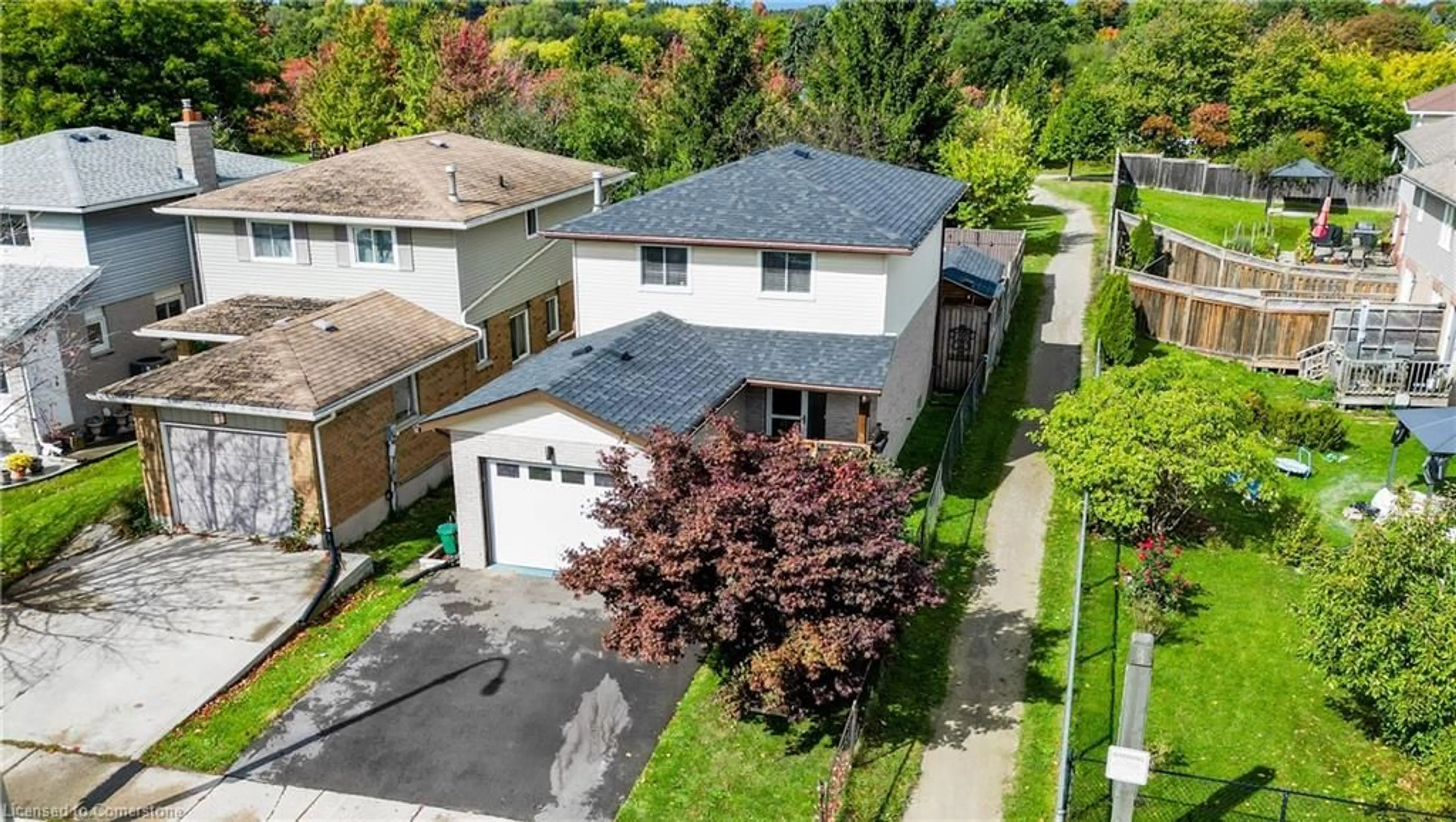 Frontside or backside of a home, the fenced backyard for 72 Windale Cres, Kitchener Ontario N2E 3H4