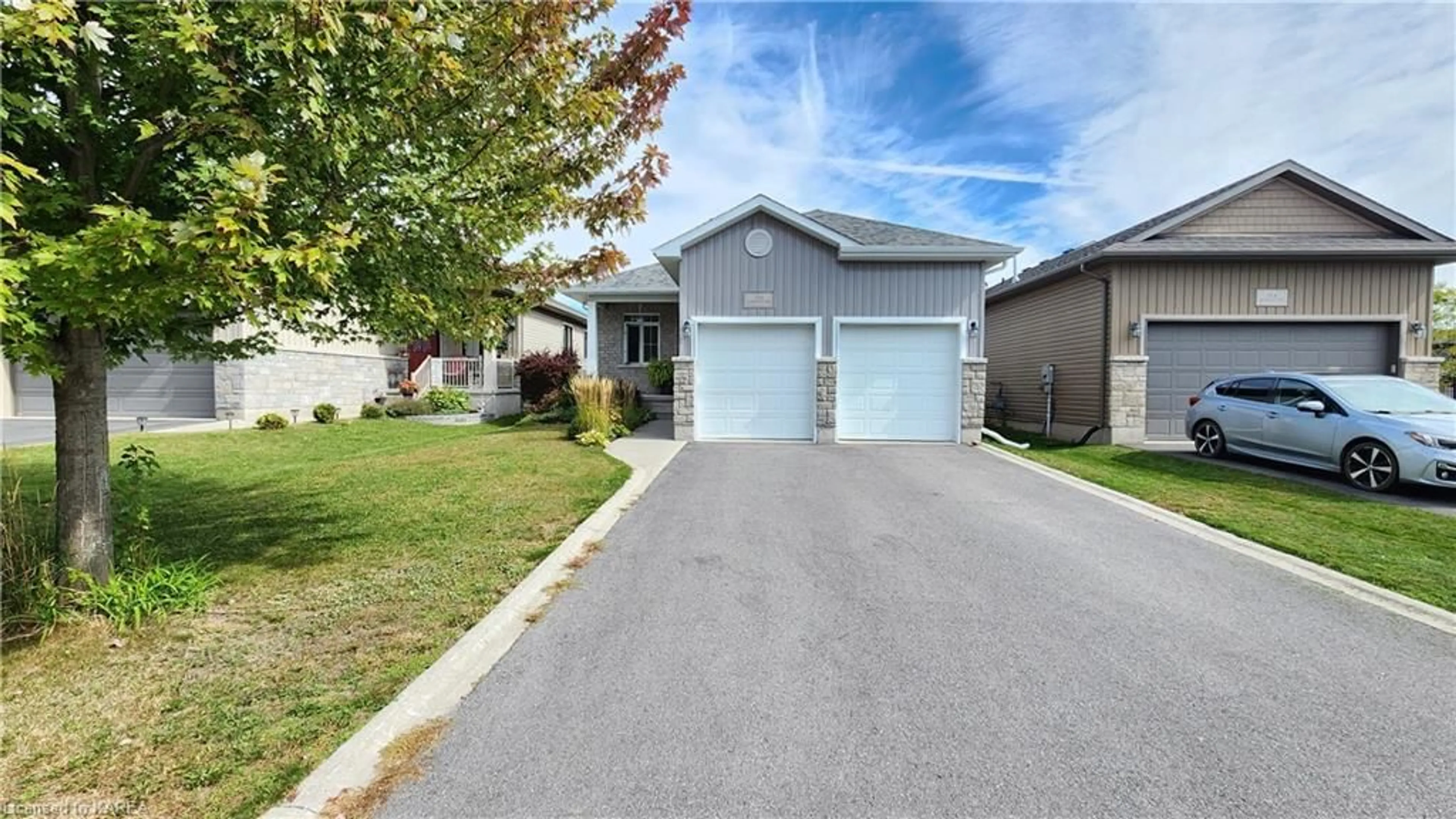 Frontside or backside of a home, the street view for 156 Mcdonough Cres, Amherstview Ontario K7N 0B3