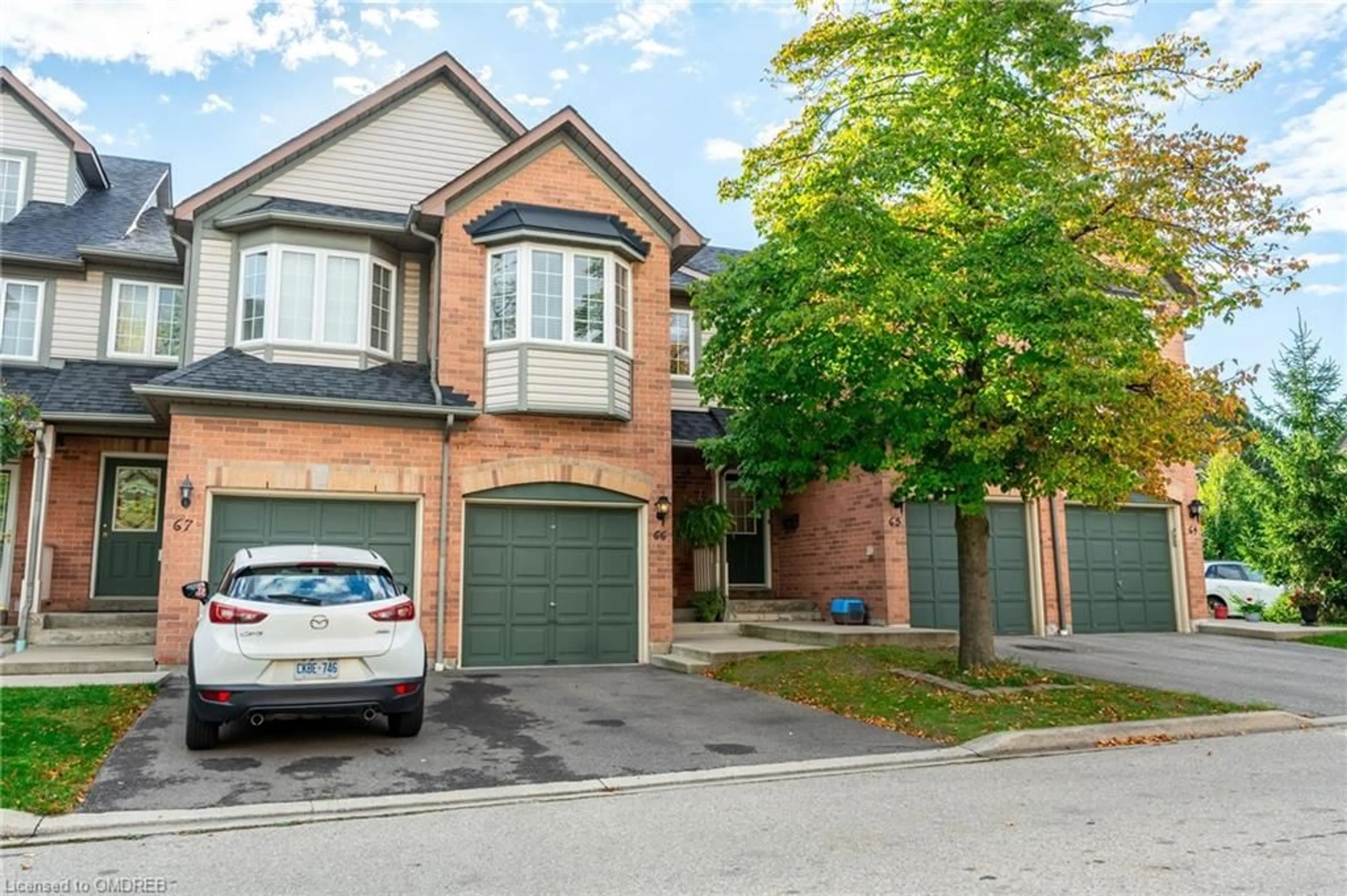 A pic from exterior of the house or condo, the street view for 2080 Leanne Blvd #66, Mississauga Ontario L5K 2S6