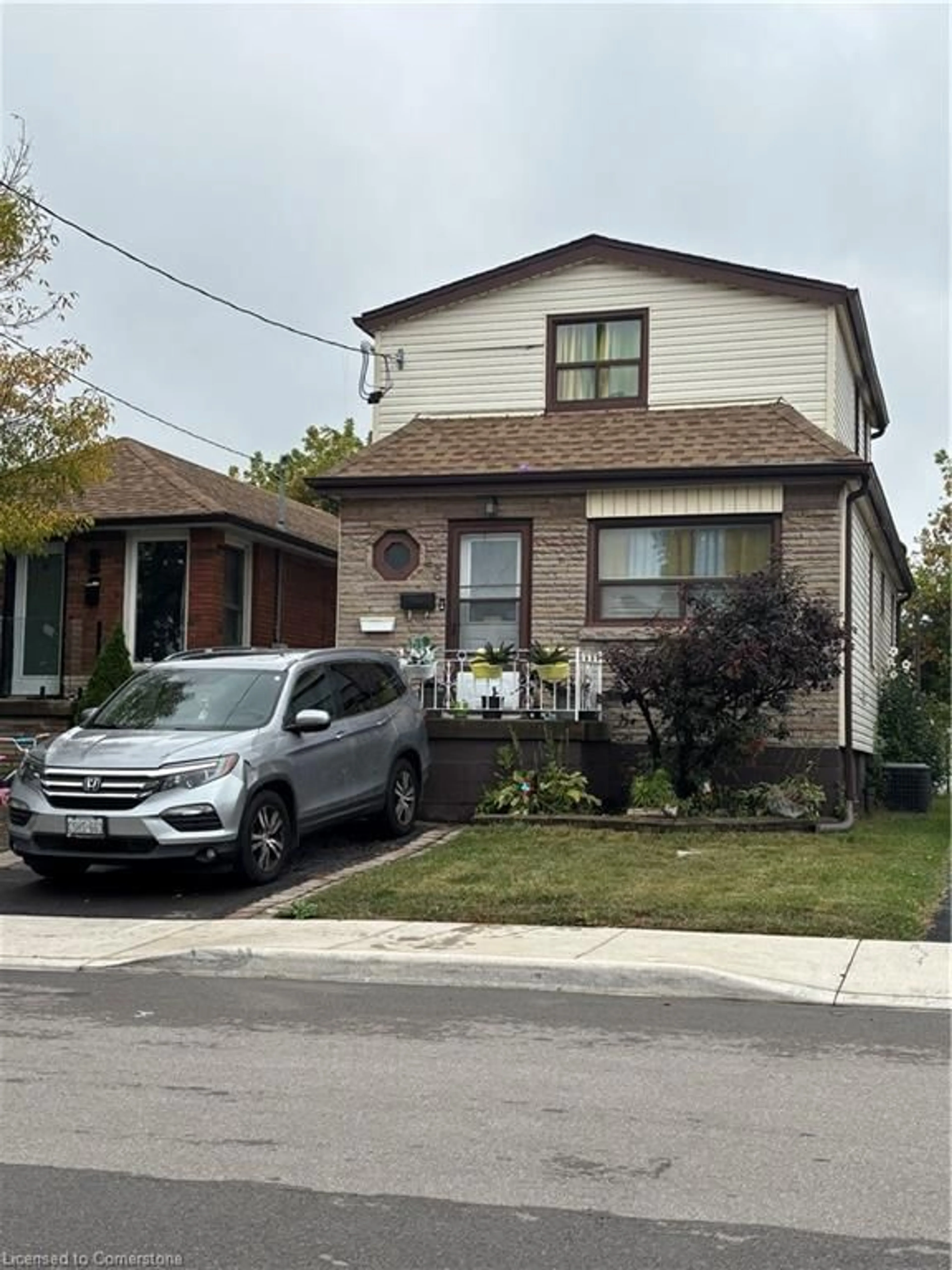 Frontside or backside of a home for 46 Delena Ave, Hamilton Ontario L8H 1B6