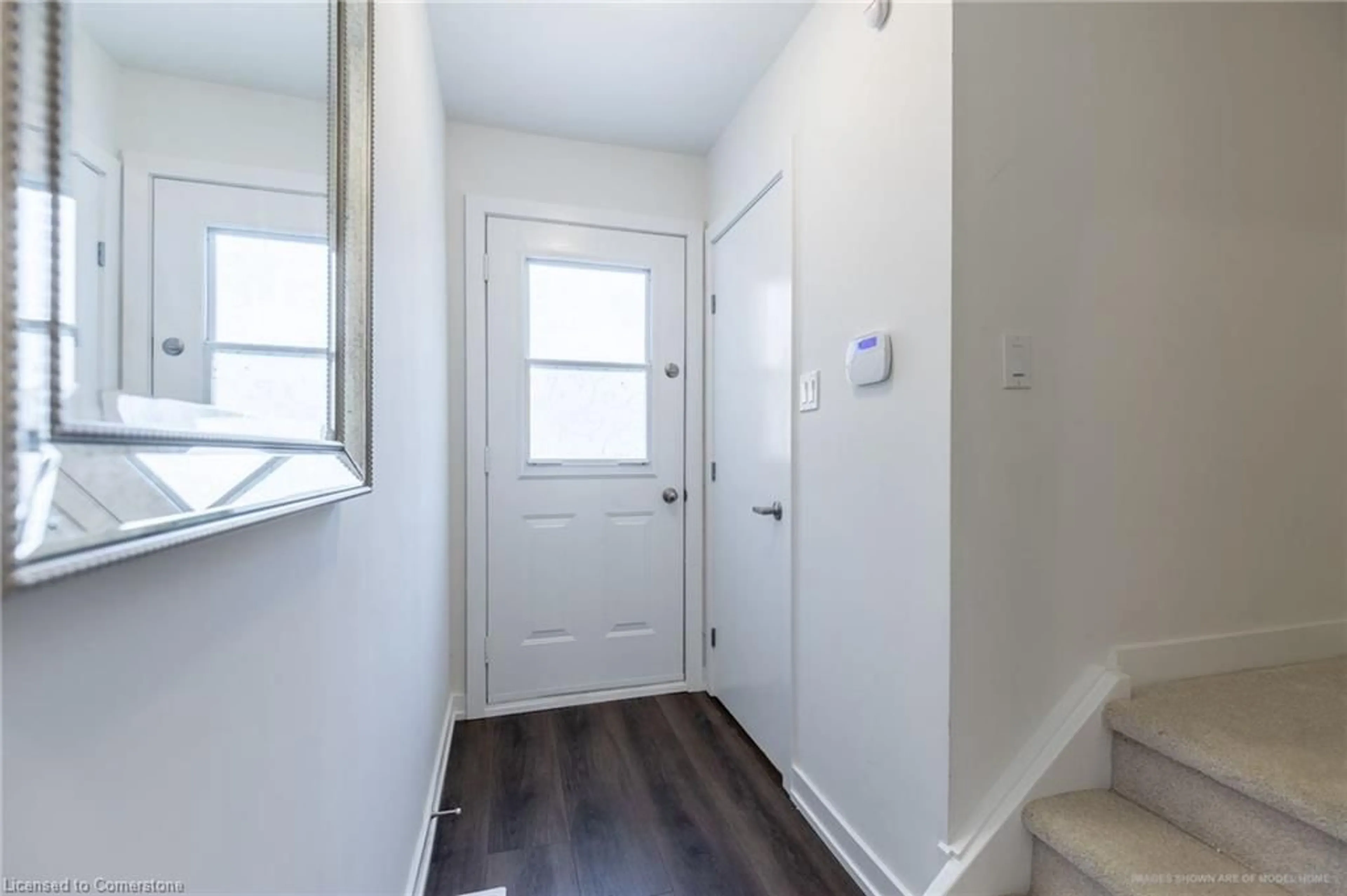 Indoor entryway, wood floors for 1444 Upper Ottawa St #28, Hamilton Ontario L8W 1N3