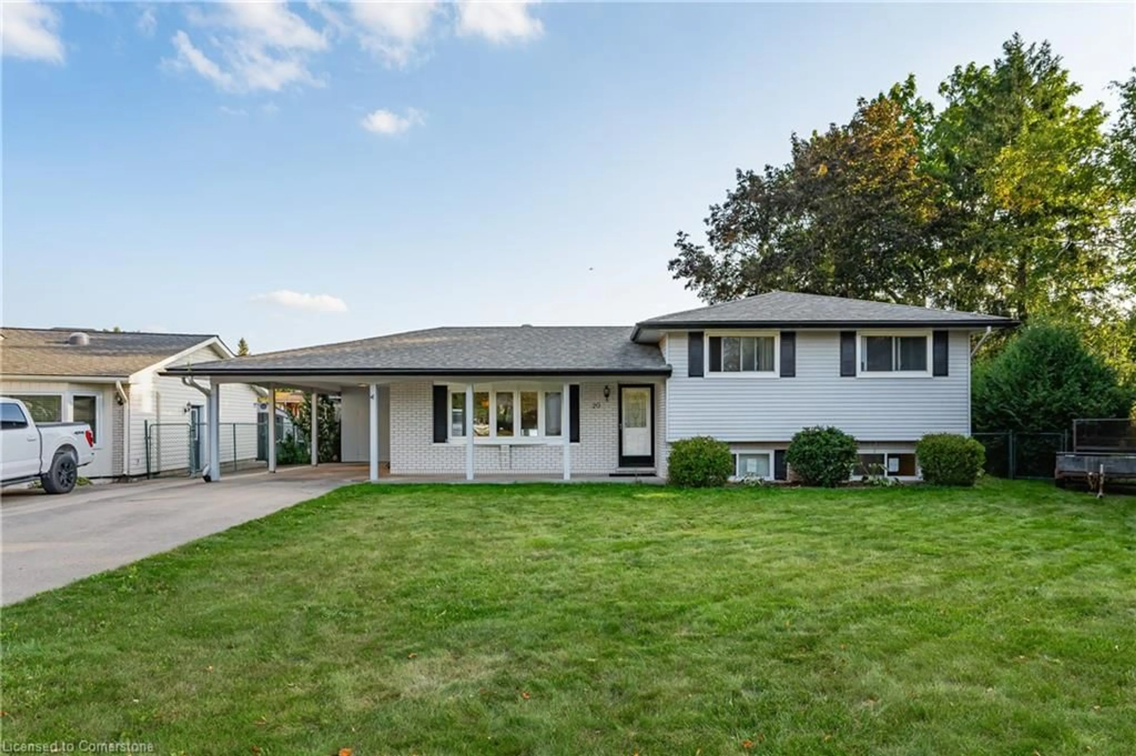 Frontside or backside of a home, the fenced backyard for 20 Lambert Pl, Kitchener Ontario N2A 1N1